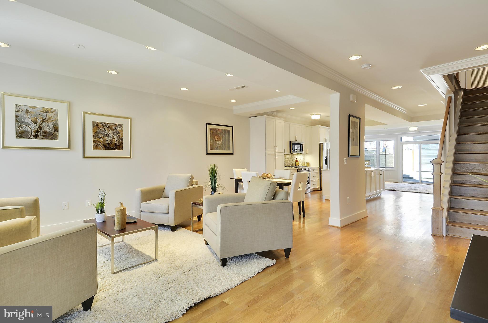 1350 K Street Southeast Washington, DC 20003 - Photo 3 of 28 a living room with furniture and a wooden floor