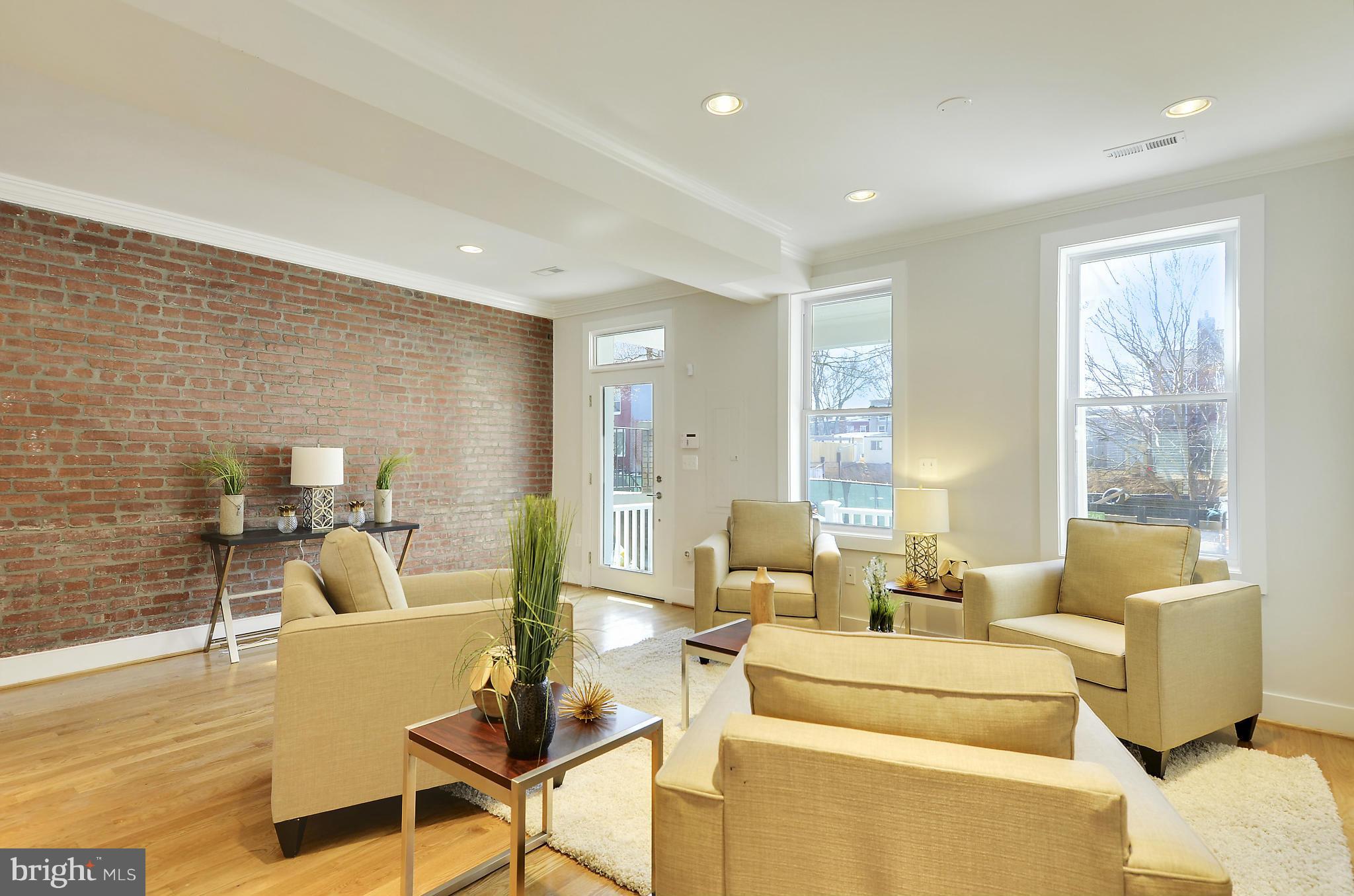 1350 K Street Southeast Washington, DC 20003 - Photo 5 of 28 a living room with furniture and a large window