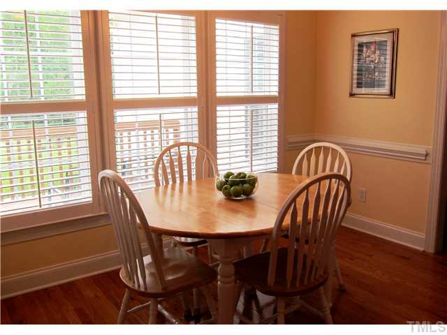 2000 Wheelerbrook Court Raleigh, NC 27603 - Photo 7 of 12 Wall of windows in the Breakfast Nook gives you a breathtaking view of the huge back yard!