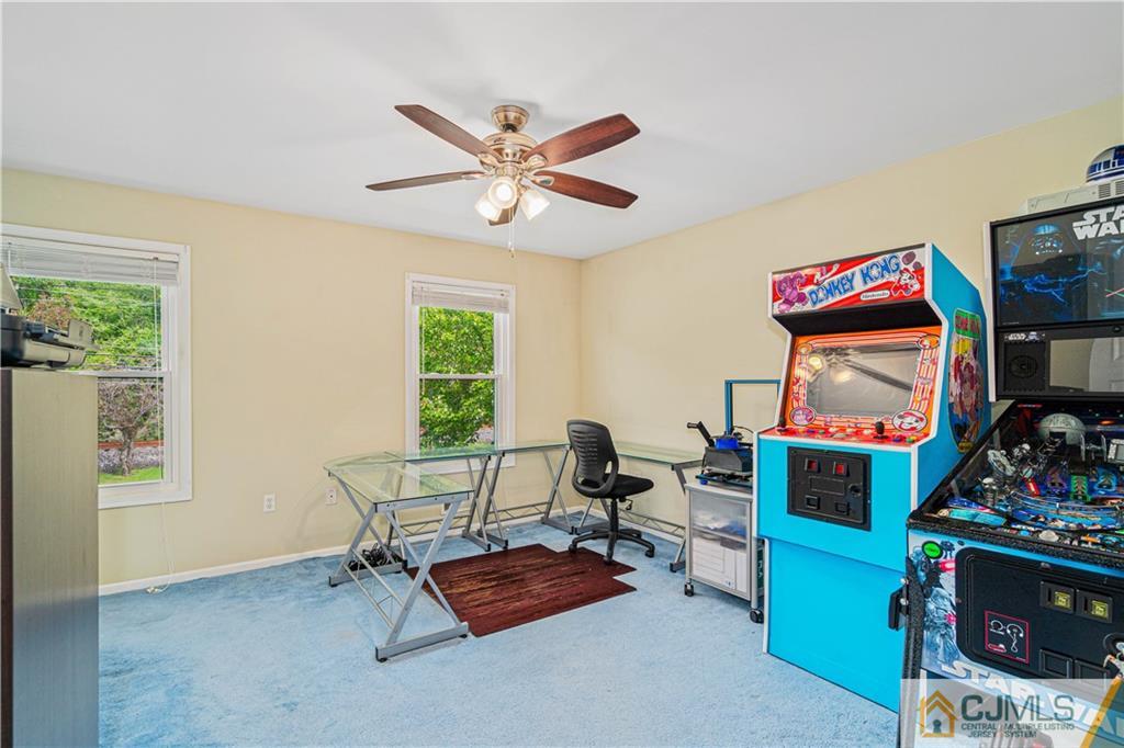 18 Main Street Helmetta, NJ 08828 - Photo 21 of 32 a living room with furniture and a window