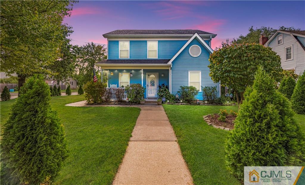 18 Main Street Helmetta, NJ 08828 - Photo 26 of 32 a front view of a house with a yard