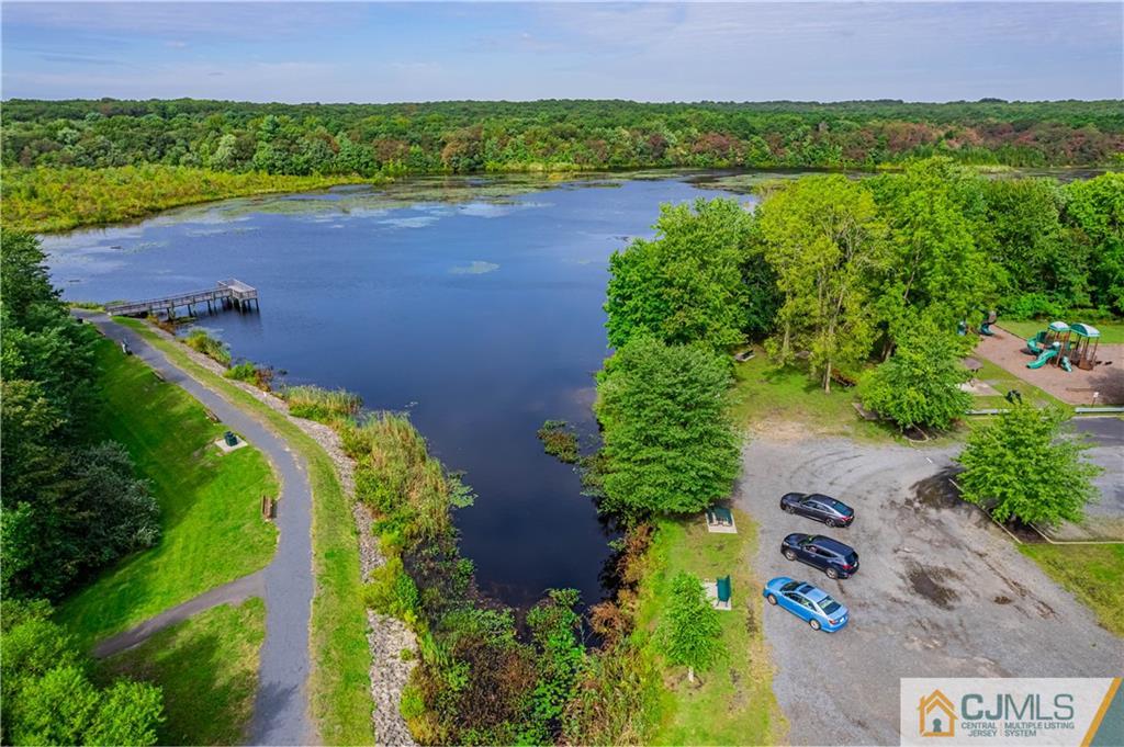 18 Main Street Helmetta, NJ 08828 - Photo 31 of 32 an aerial view of a house with a yard and lake view