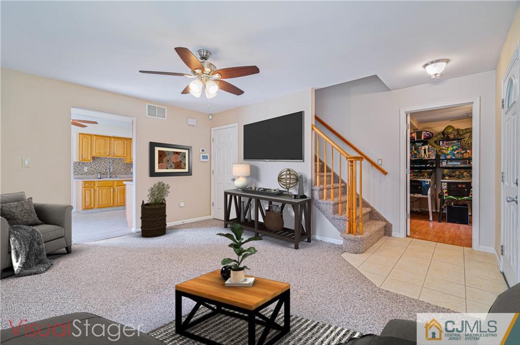 18 Main Street Helmetta, NJ 08828 - Photo 4 of 32 a living room with furniture and a table