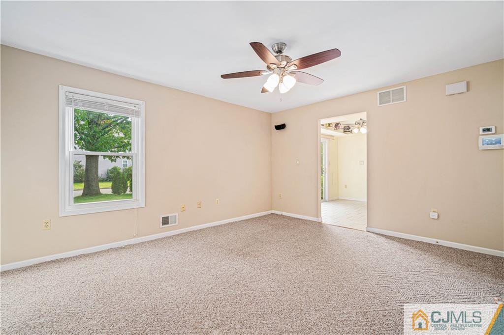 18 Main Street Helmetta, NJ 08828 - Photo 7 of 32 a view of an empty room with a window