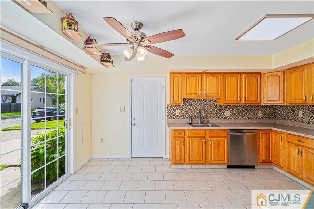 18 Main Street Helmetta, NJ 08828 - Photo 10 of 32 a view of a kitchen with a sink and cabinets