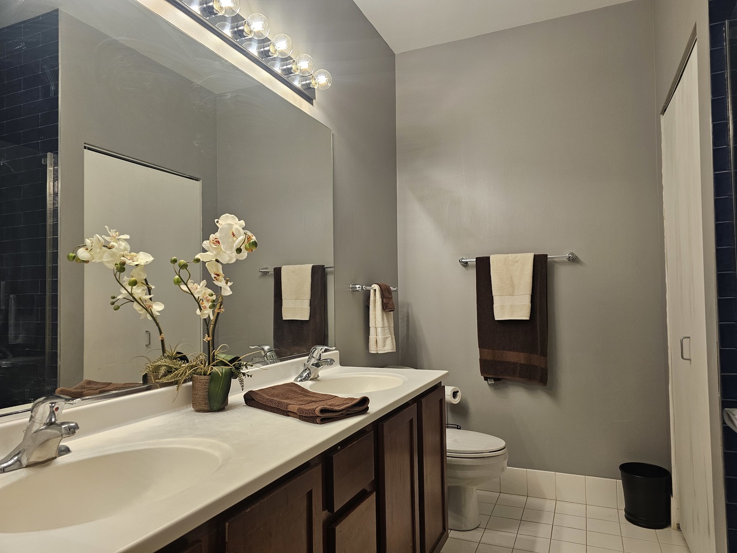 2323 West Pershing Road, Unit 230 Chicago, IL 60609 - Photo 20 of 30 a bathroom with a sink a toilet and mirror
