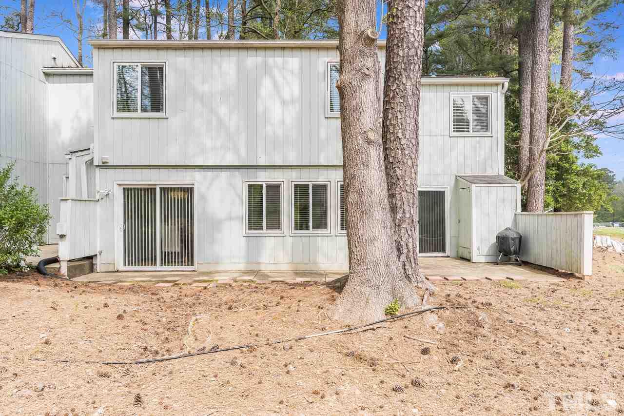 728 Godwin Court Raleigh, NC 27606 - Photo 23 of 25 a view of a house with a tree