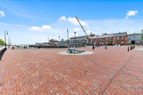 a outdoor space with lots of residential buildings and ocean view