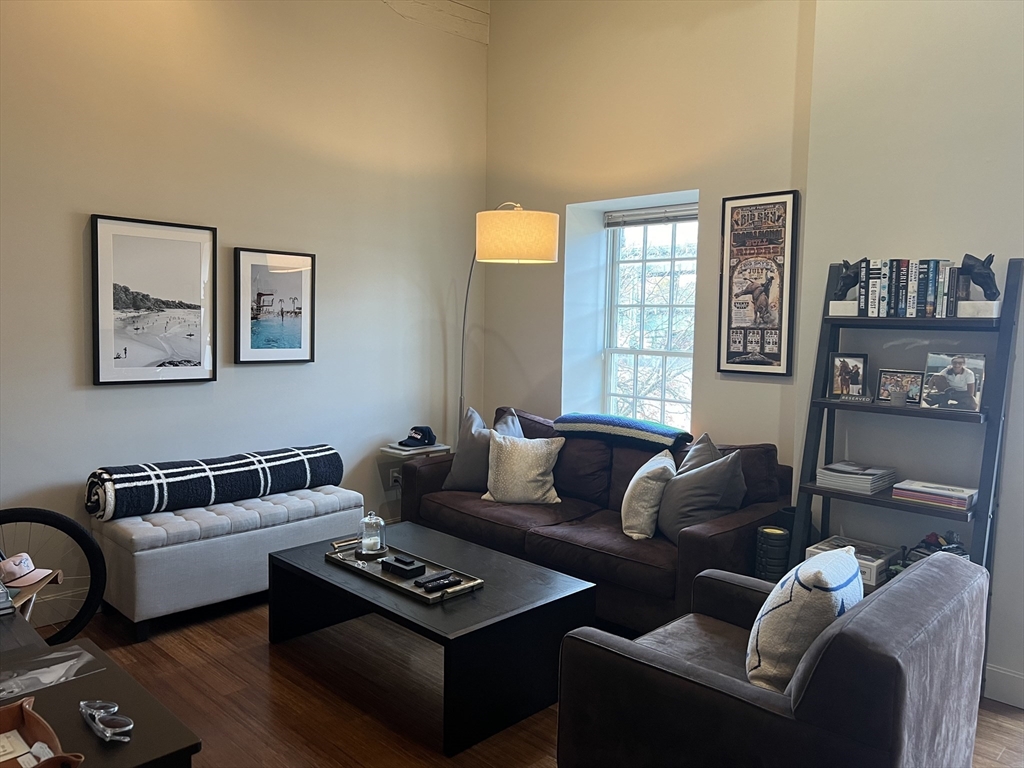 33 3rd Avenue, Unit 313 Boston, MA 02129 - Photo 7 of 18 a living room with furniture