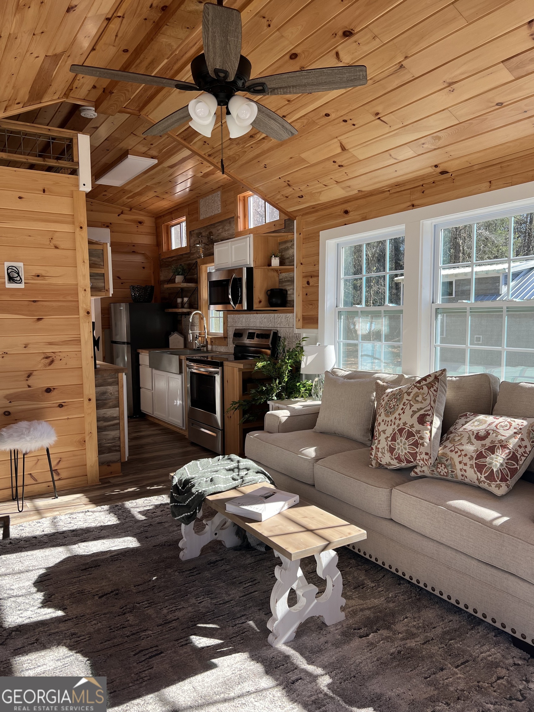 4960 Laurel Lodge Road, Unit 41 Clarkesville, GA 30523 - Photo 11 of 46 a living room with furniture and a fireplace