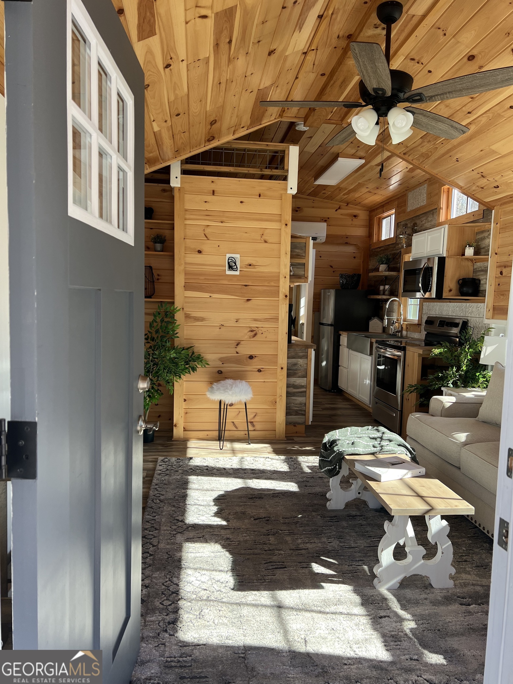 4960 Laurel Lodge Road, Unit 41 Clarkesville, GA 30523 - Photo 12 of 46 a building outdoor space with patio furniture and potted plants