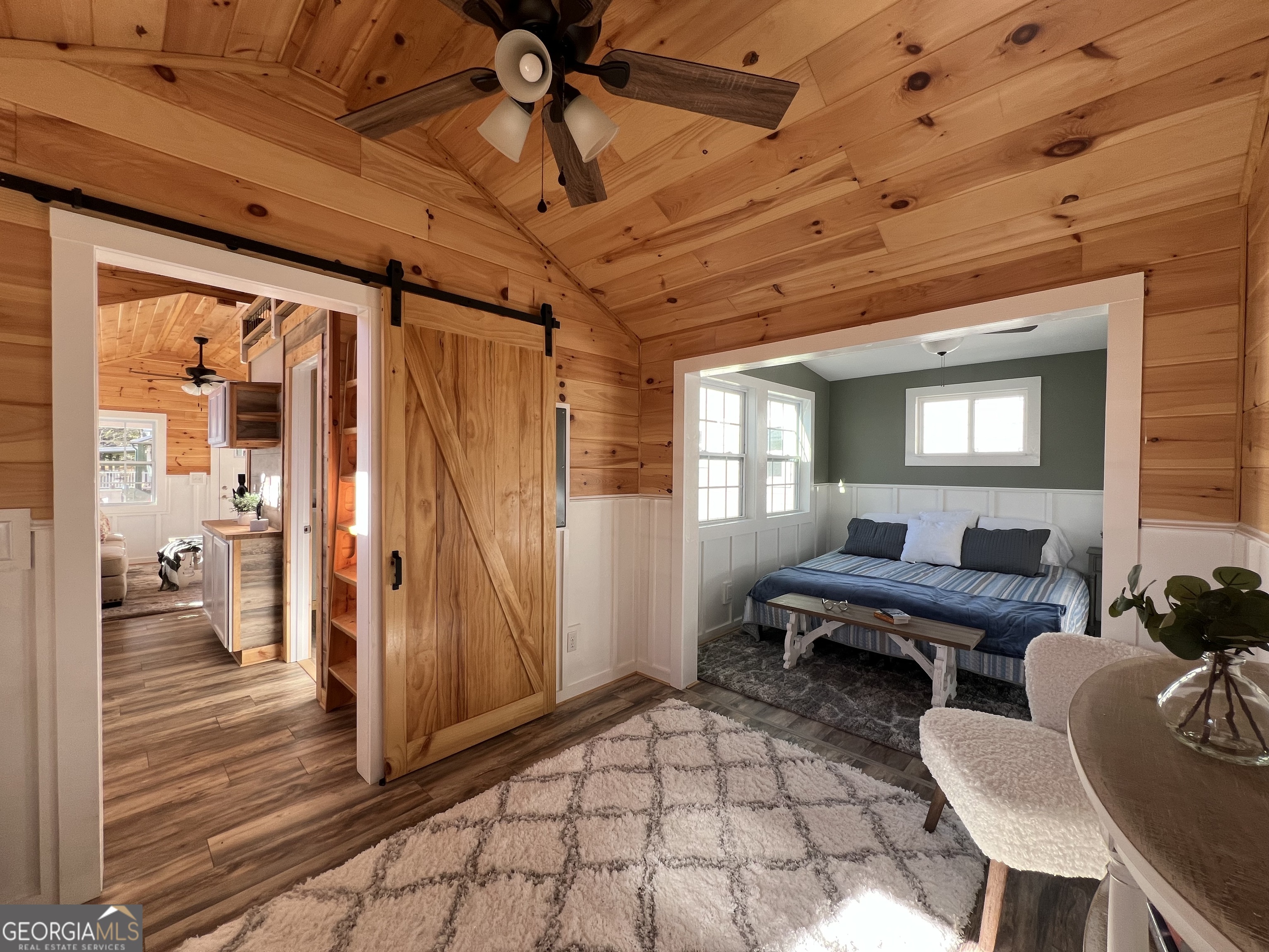 4960 Laurel Lodge Road, Unit 41 Clarkesville, GA 30523 - Photo 22 of 46 a outdoor space with lots of furniture and wooden floor