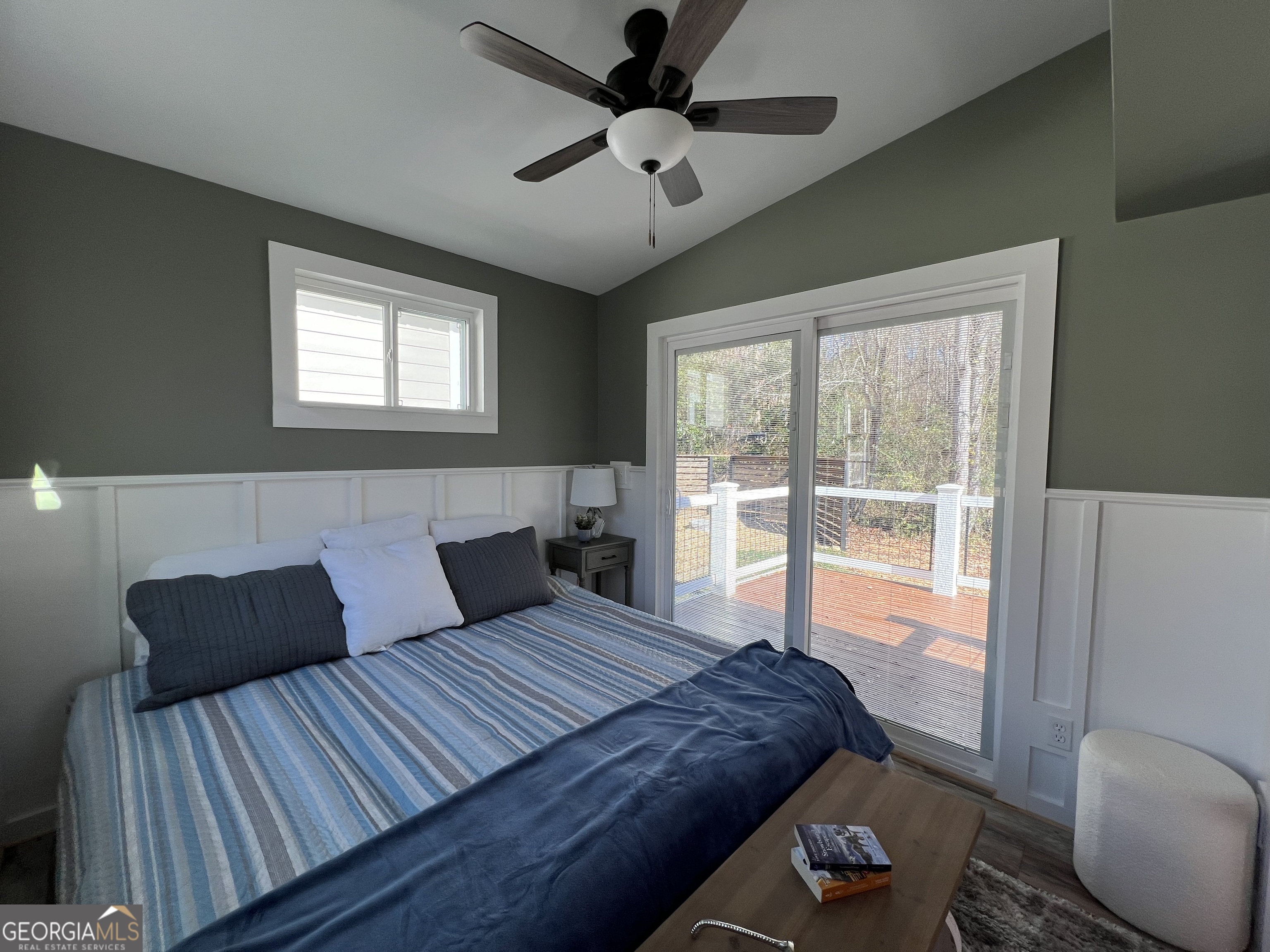 4960 Laurel Lodge Road, Unit 41 Clarkesville, GA 30523 - Photo 24 of 46 a bedroom with a bed and a large window