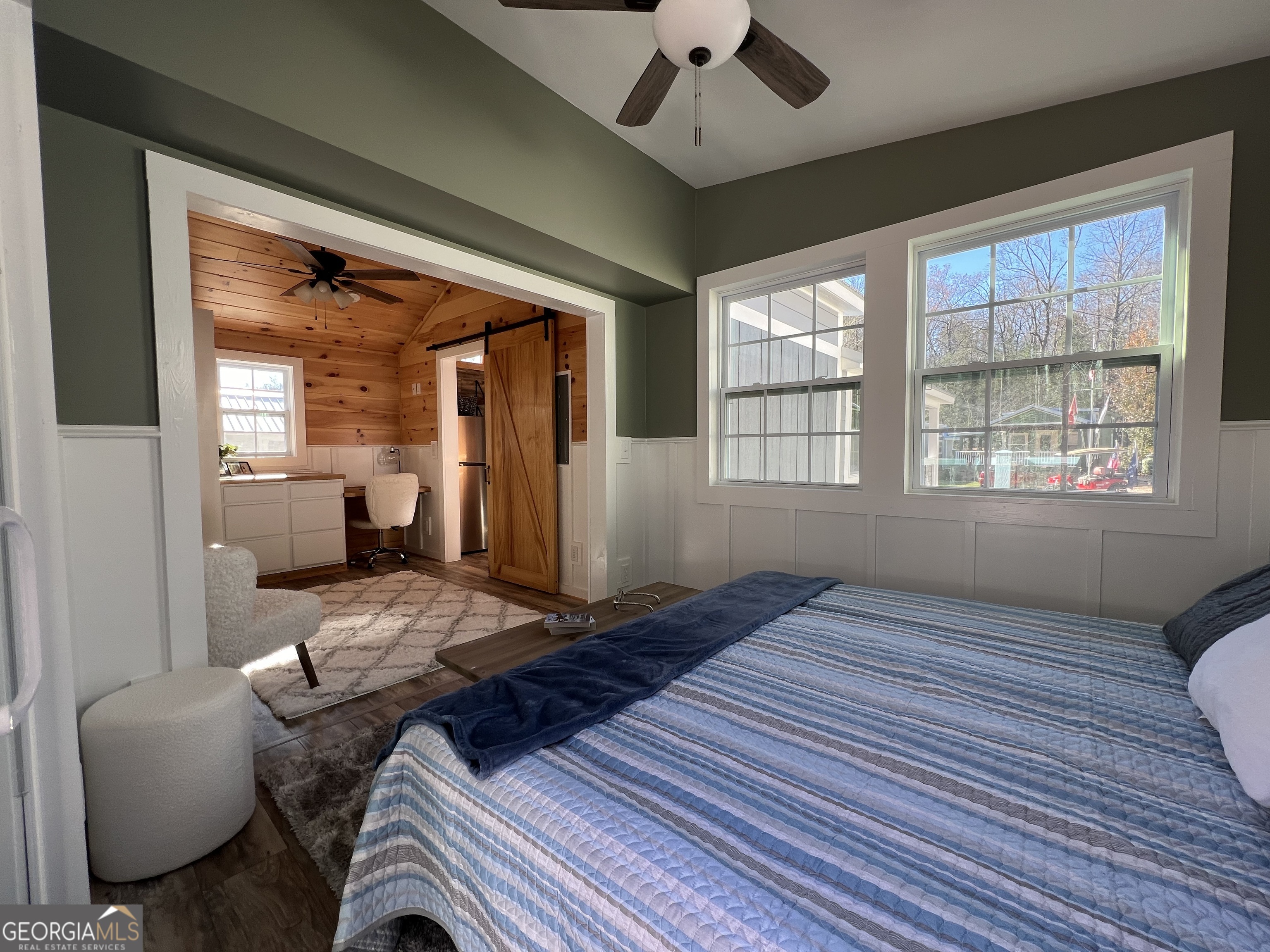 4960 Laurel Lodge Road, Unit 41 Clarkesville, GA 30523 - Photo 28 of 46 a bedroom with furniture and wooden floor