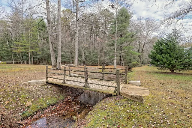 a view of a bench in a backyard