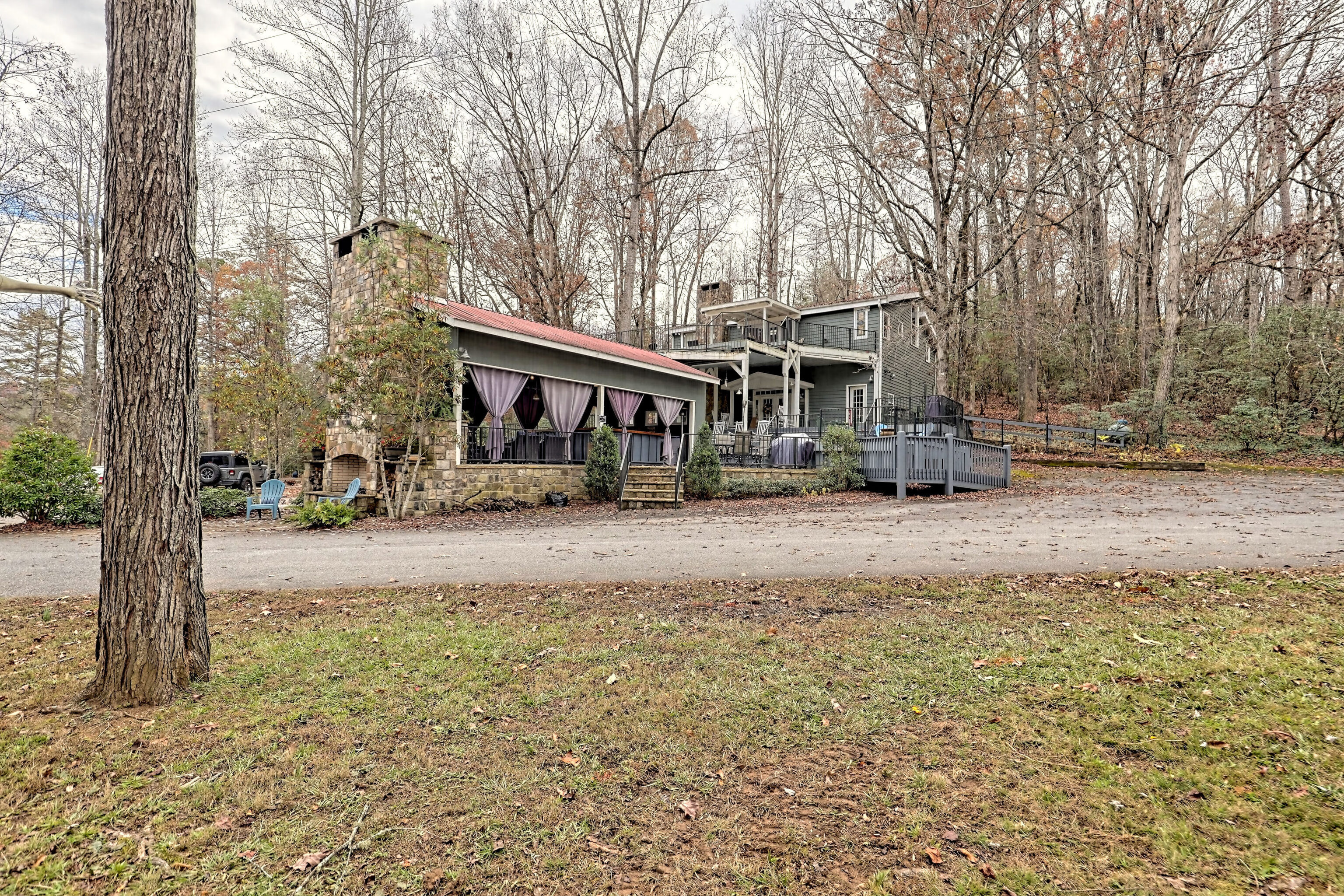 4960 Laurel Lodge Road, Unit 41 Clarkesville, GA 30523 - Photo 37 of 46 a front view of a house with a yard and trees