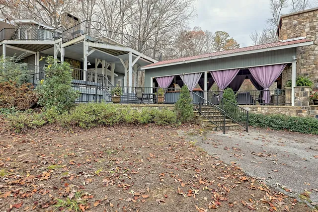 a view of residential house with trees all around
