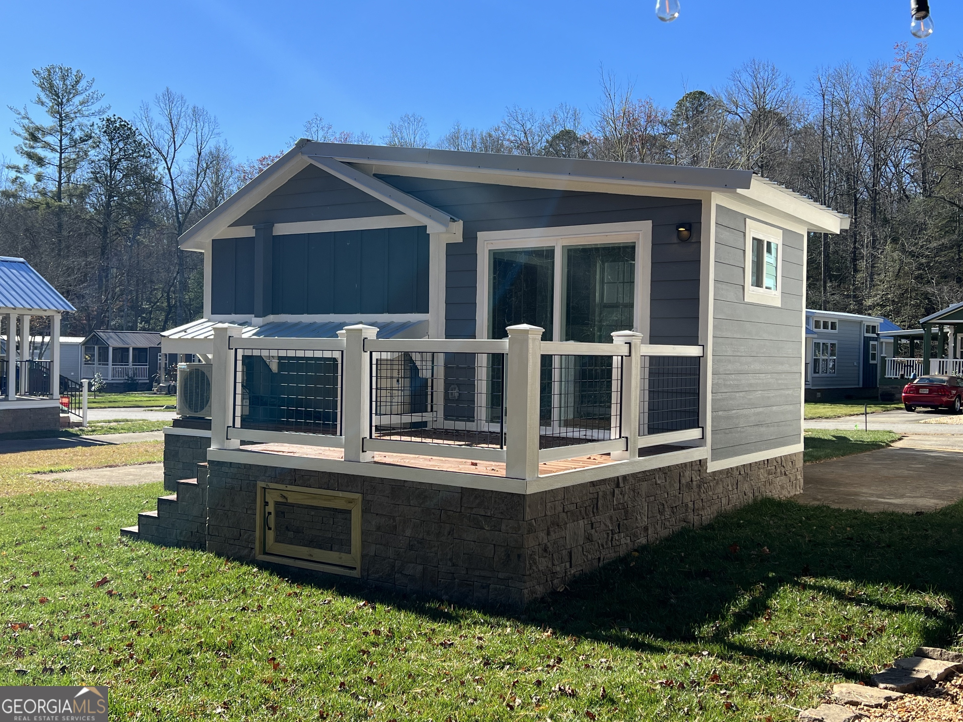 4960 Laurel Lodge Road, Unit 41 Clarkesville, GA 30523 - Photo 5 of 46 a front view of house with yard