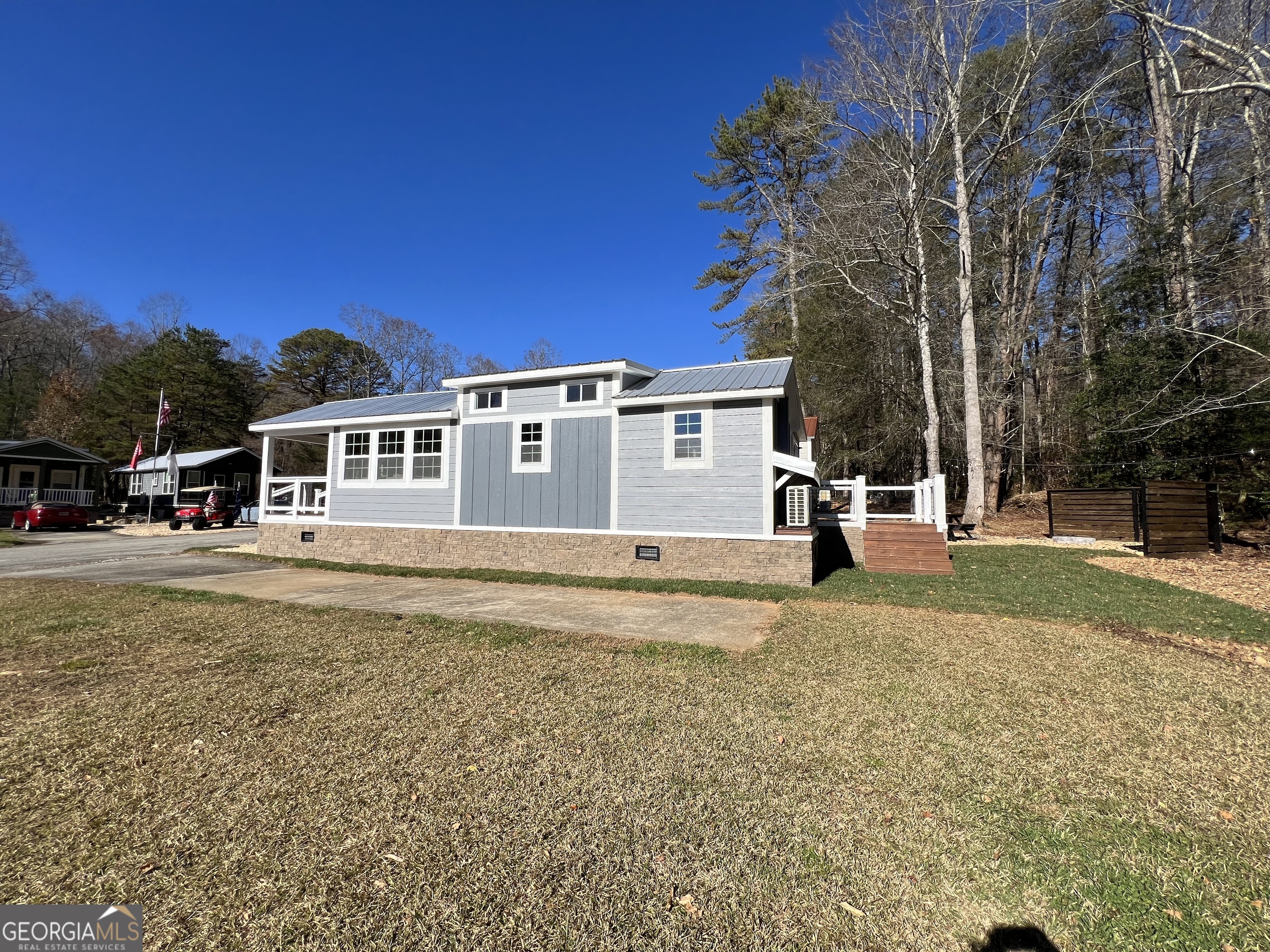 4960 Laurel Lodge Road, Unit 41 Clarkesville, GA 30523 - Photo 8 of 46 a house view with a outdoor space