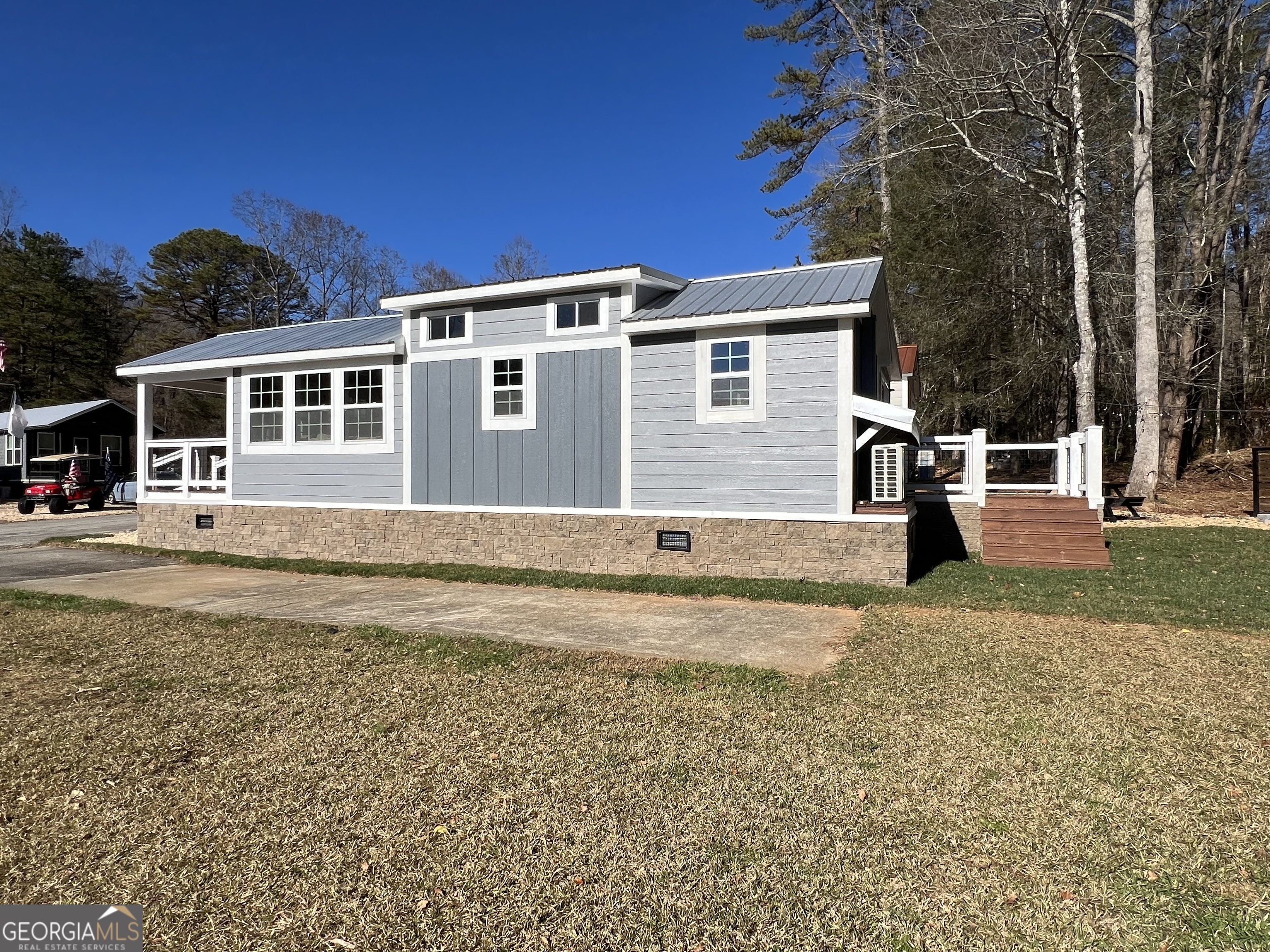 4960 Laurel Lodge Road, Unit 41 Clarkesville, GA 30523 - Photo 9 of 46 a house view with a outdoor space