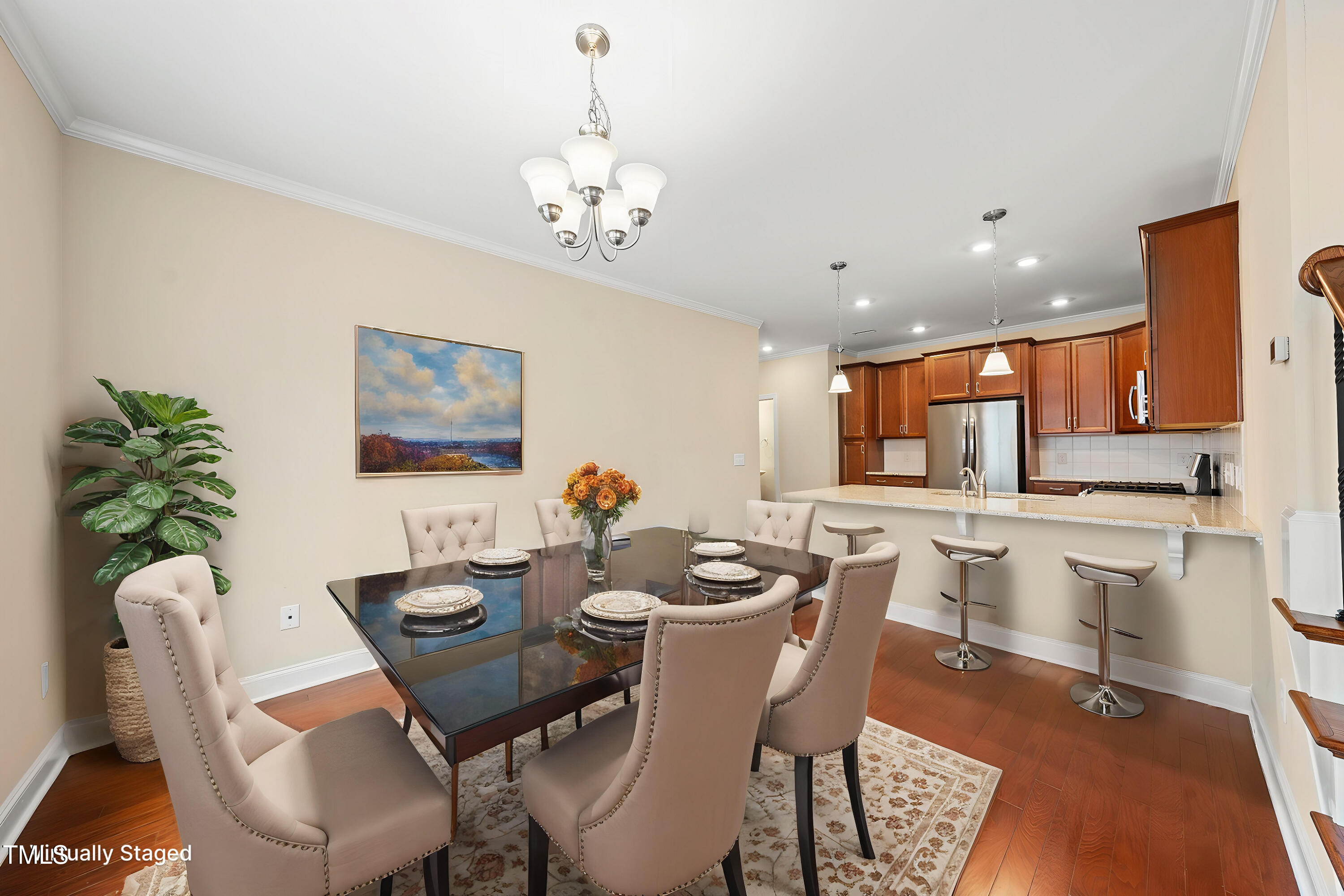 111 Wards Ridge Drive Cary, NC 27513 - Photo 14 of 46 a dining room with wooden floor a chandelier a glass table and chairs