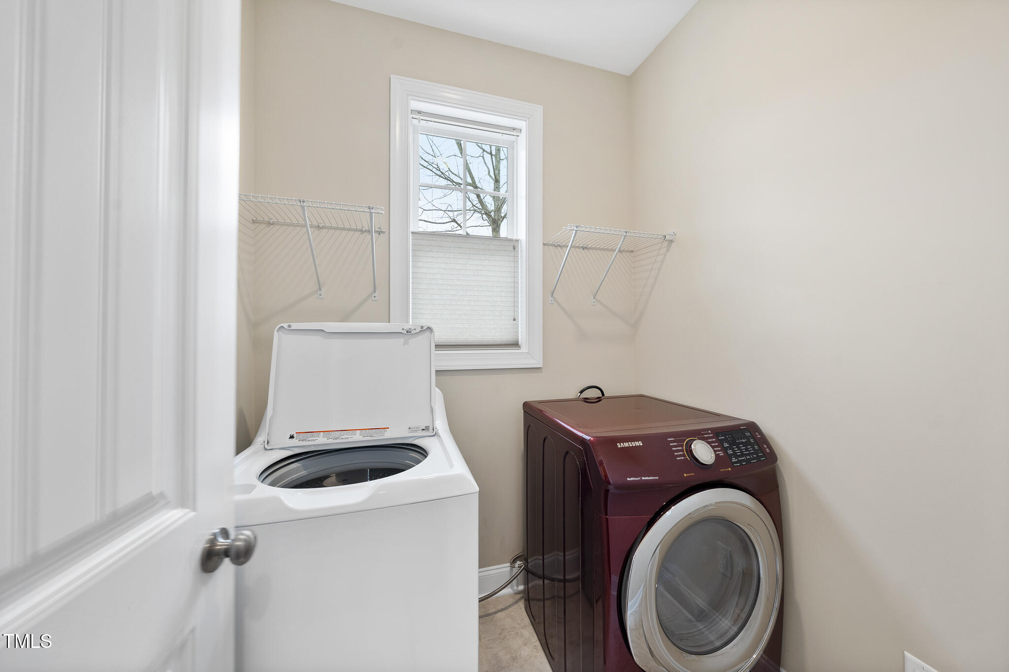 111 Wards Ridge Drive Cary, NC 27513 - Photo 22 of 46 a utility room with dryer and washer