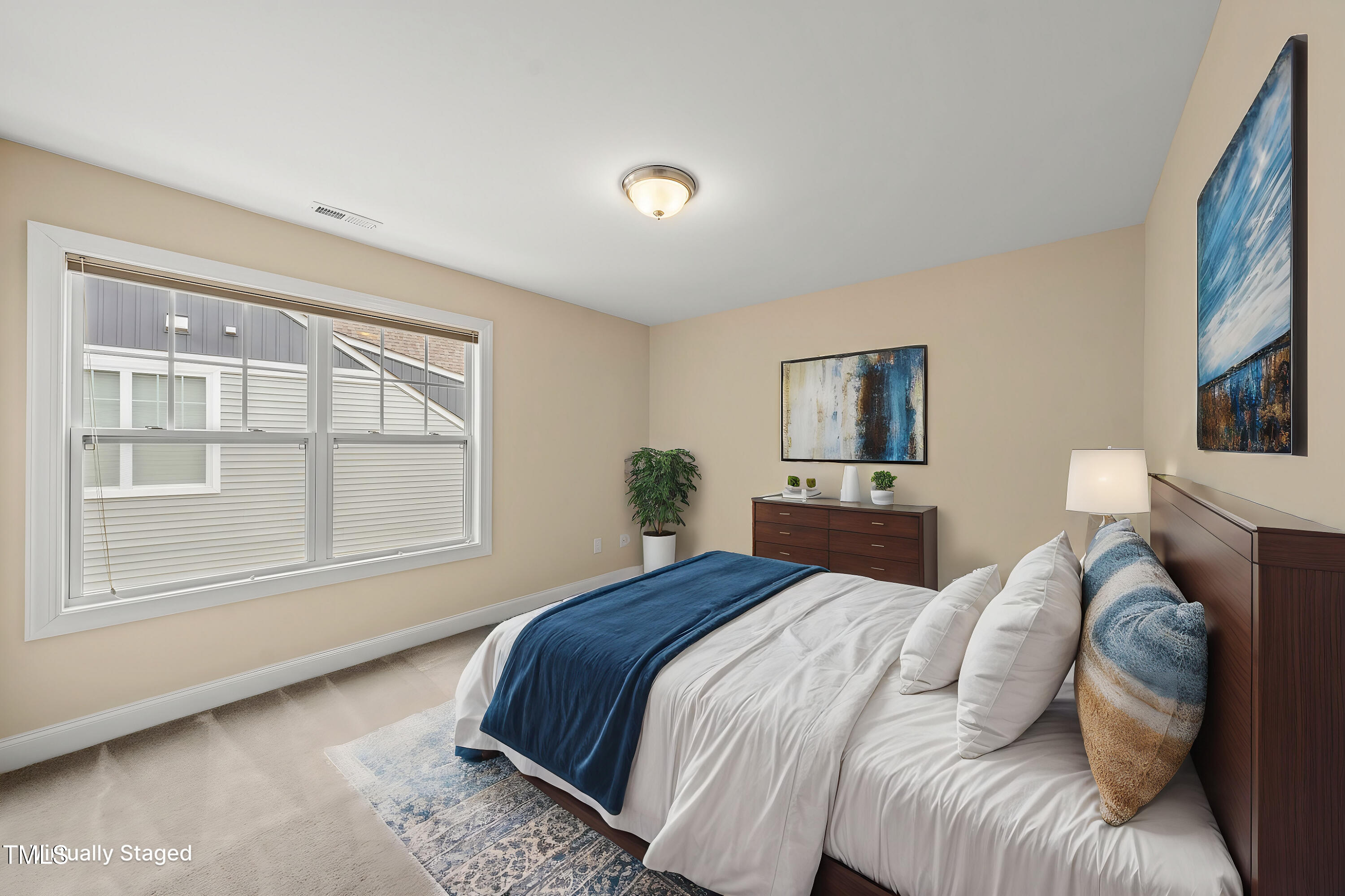 111 Wards Ridge Drive Cary, NC 27513 - Photo 35 of 46 a bedroom with a bed and wooden floor