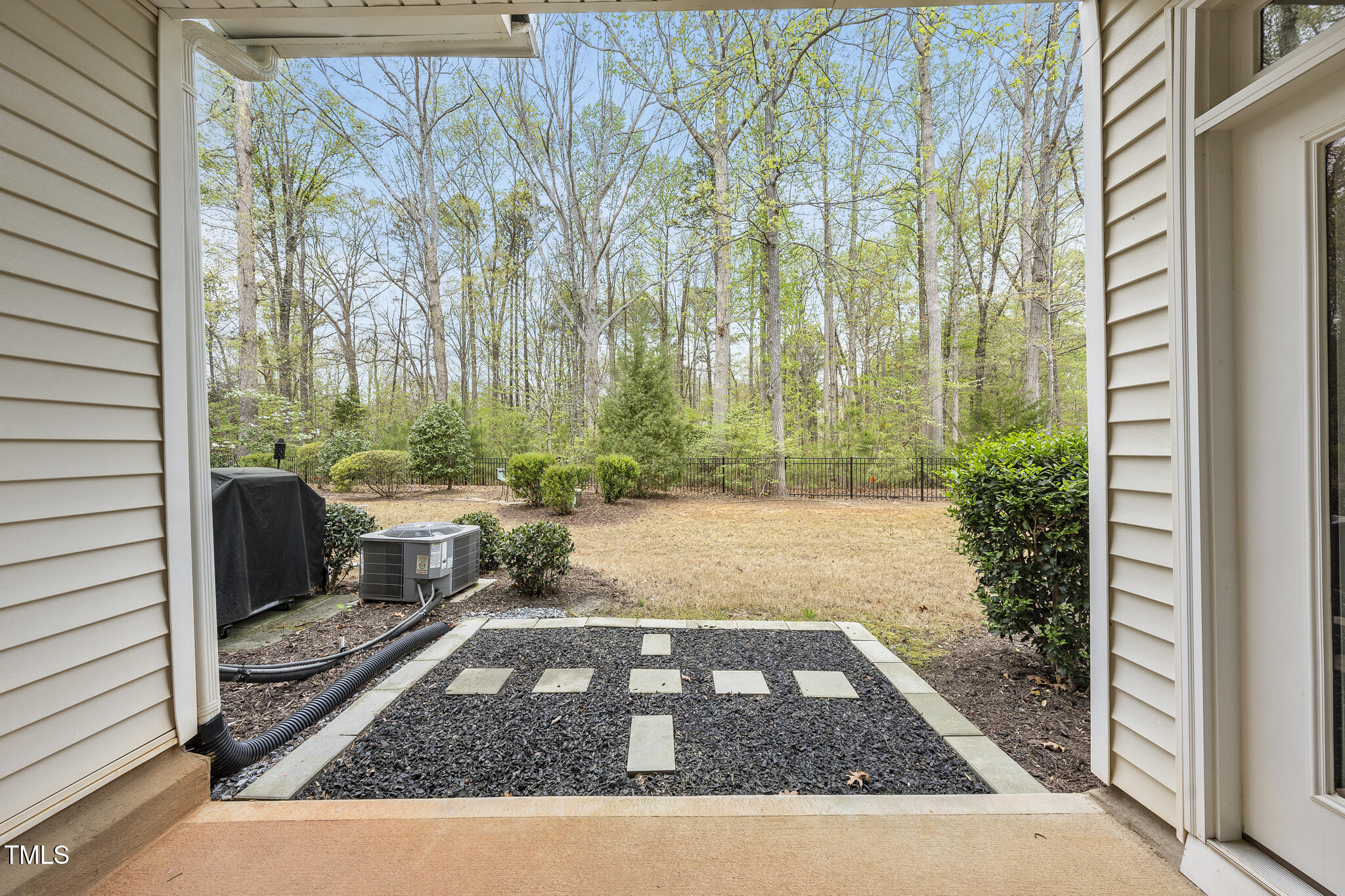 111 Wards Ridge Drive Cary, NC 27513 - Photo 42 of 46 a view of a back yard from a patio