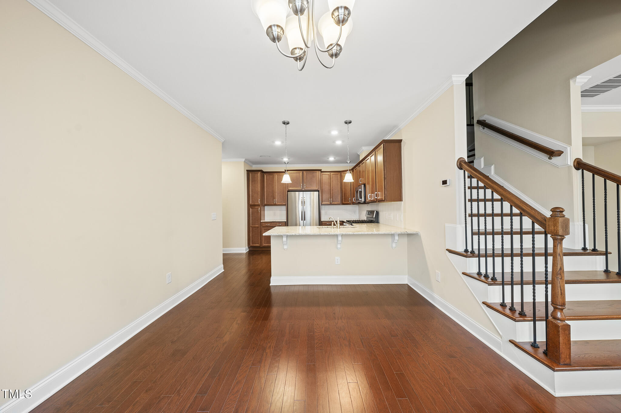111 Wards Ridge Drive Cary, NC 27513 - Photo 7 of 46 a view of kitchen and hall with wooden floor