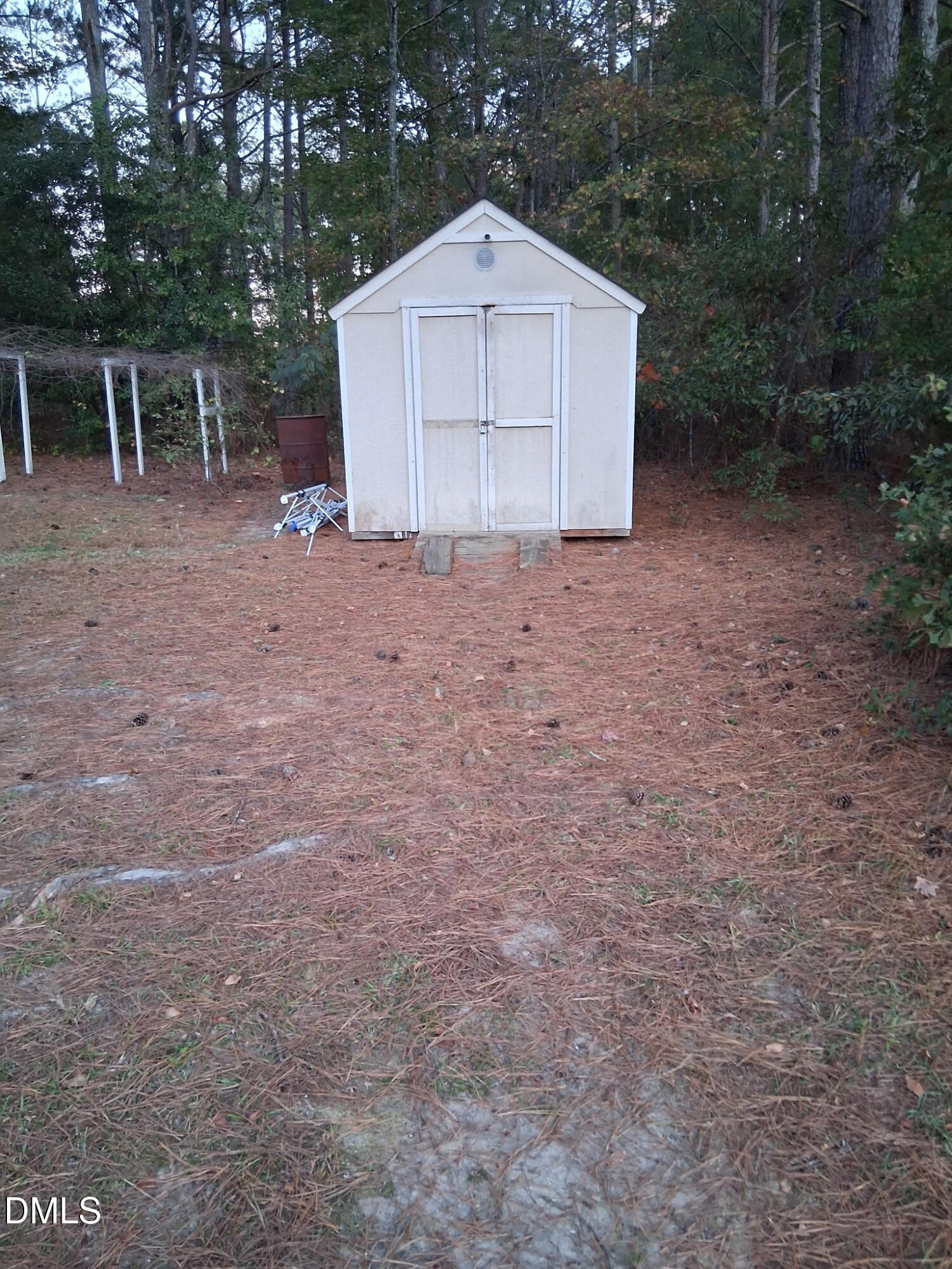 443 Tranquil Lane Willow Spring, NC 27592 - Photo 17 of 23 a view of backyard and garage