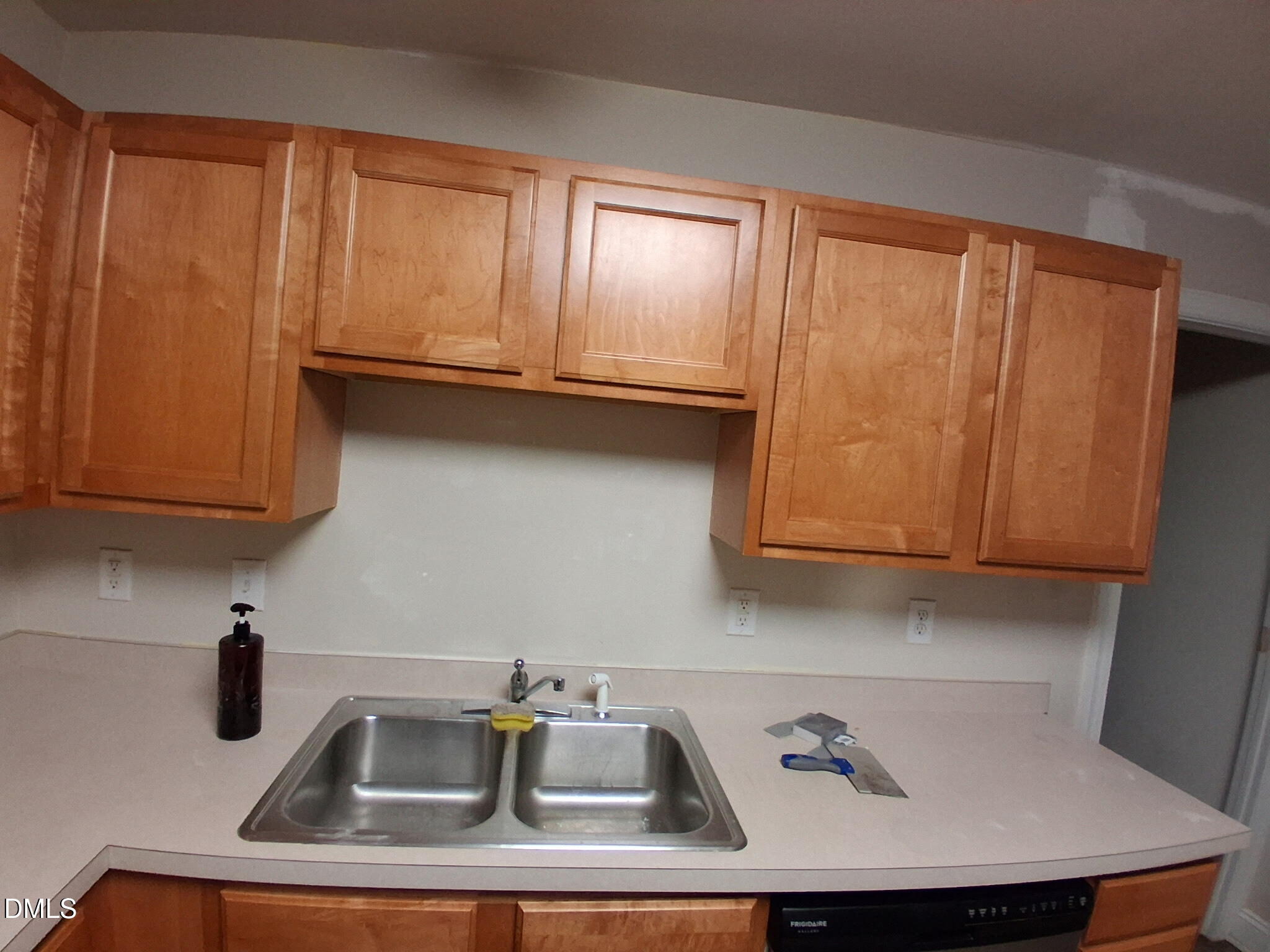 443 Tranquil Lane Willow Spring, NC 27592 - Photo 6 of 23 a kitchen with a sink and cabinets