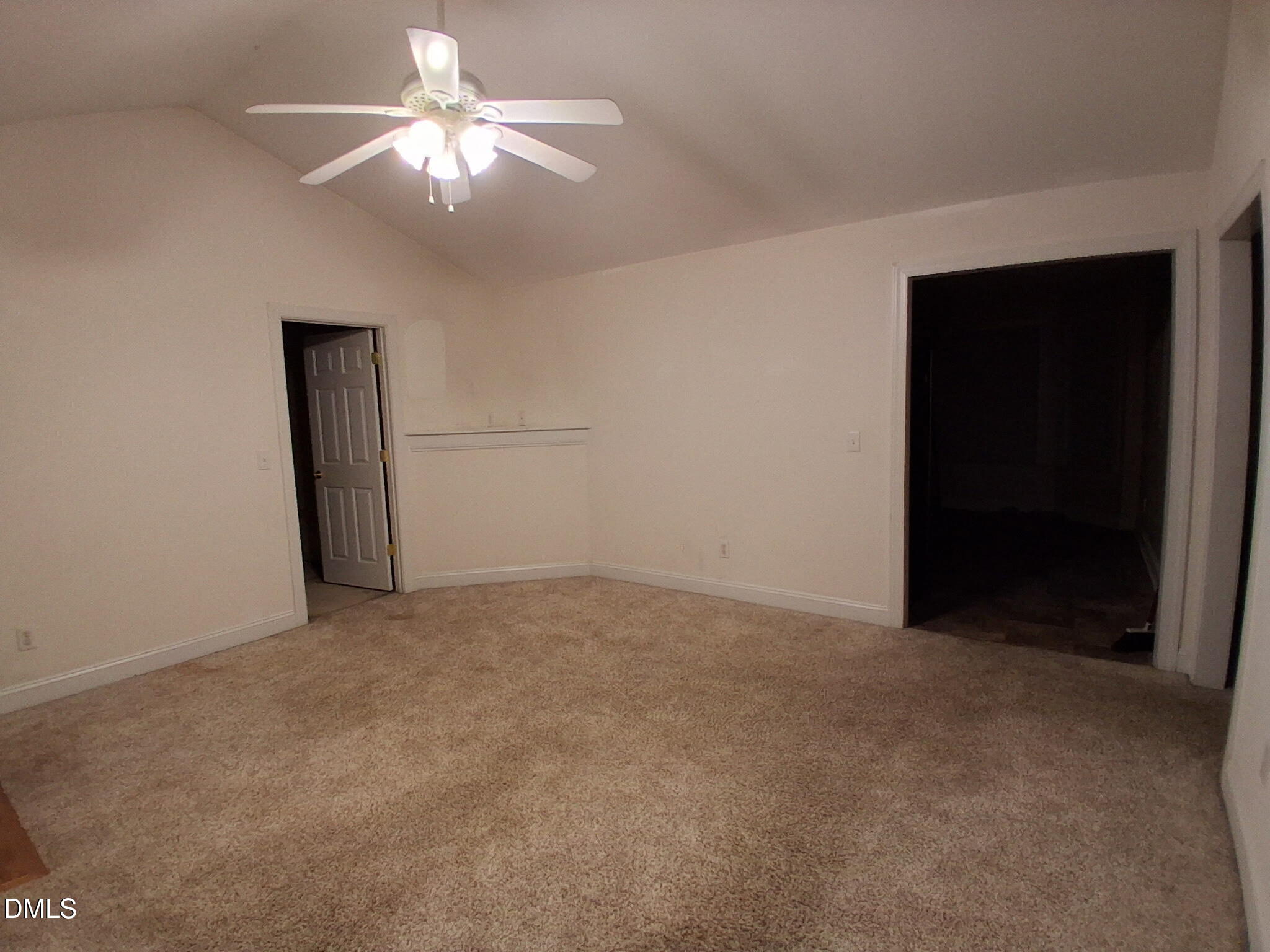 443 Tranquil Lane Willow Spring, NC 27592 - Photo 7 of 23 an empty room with closet and a chandelier fan