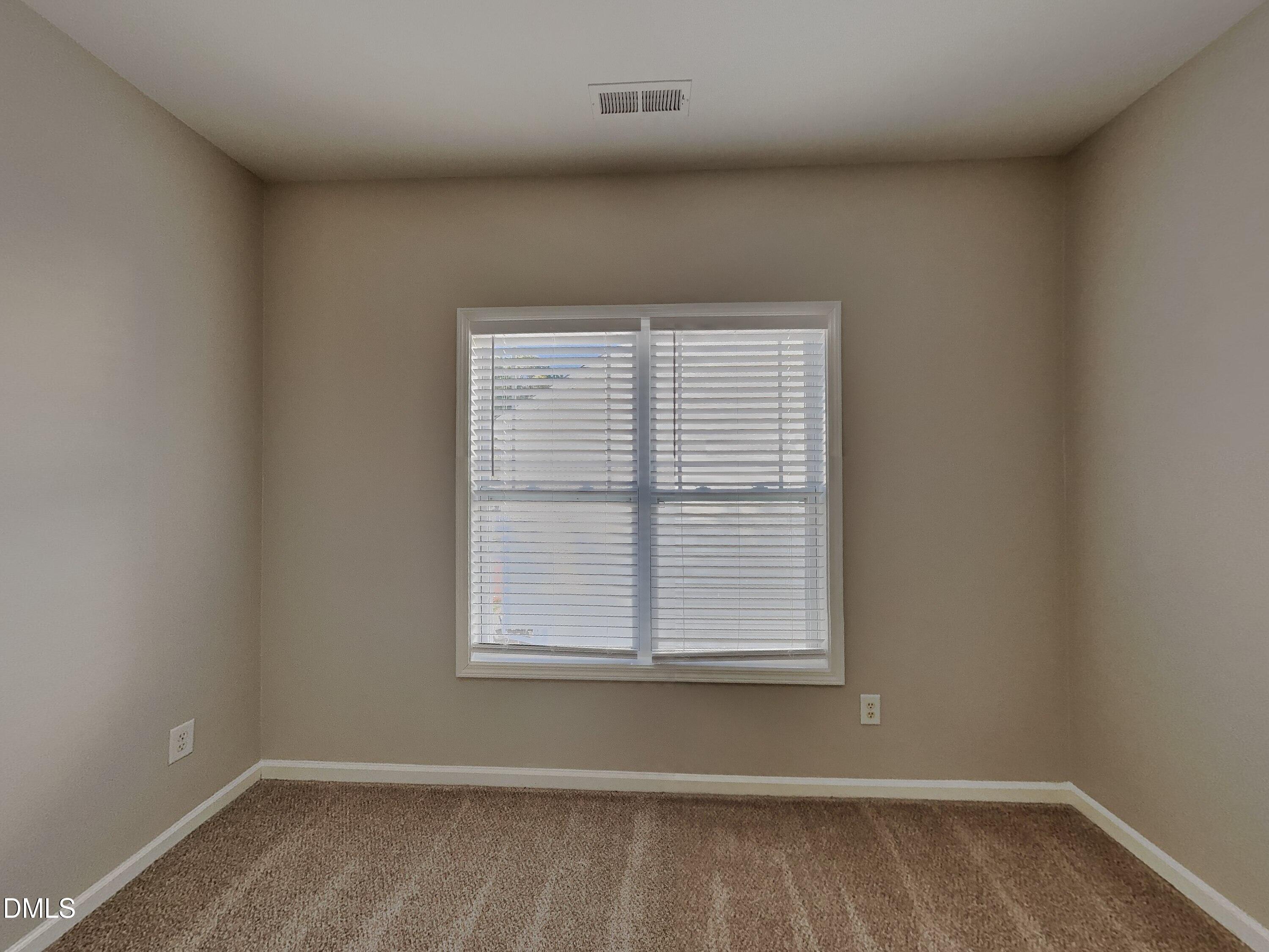3152 Landing Falls Lane Raleigh, NC 27616 - Photo 17 of 24 an empty room with a window