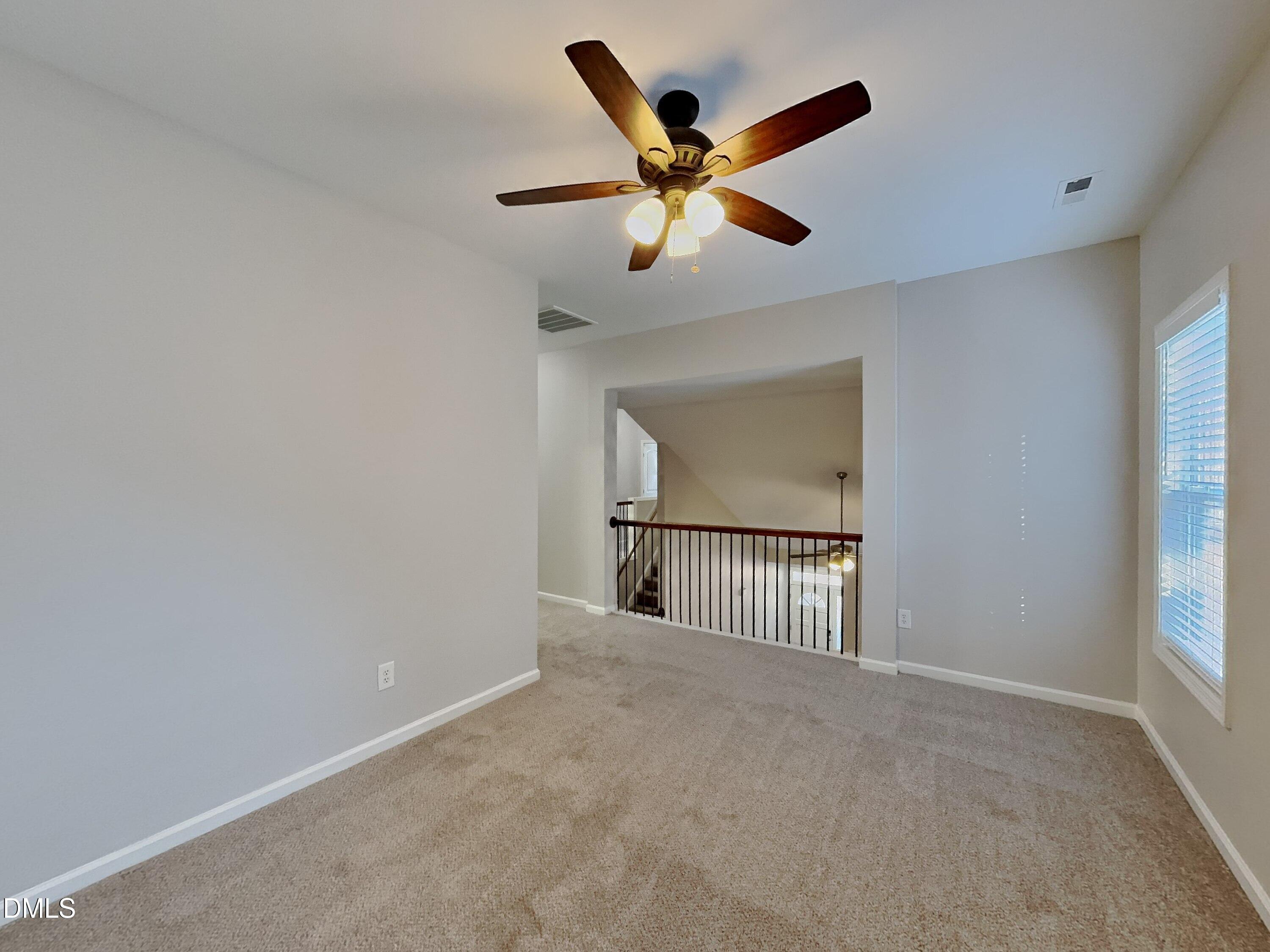 3152 Landing Falls Lane Raleigh, NC 27616 - Photo 21 of 24 a view of an empty room with a window