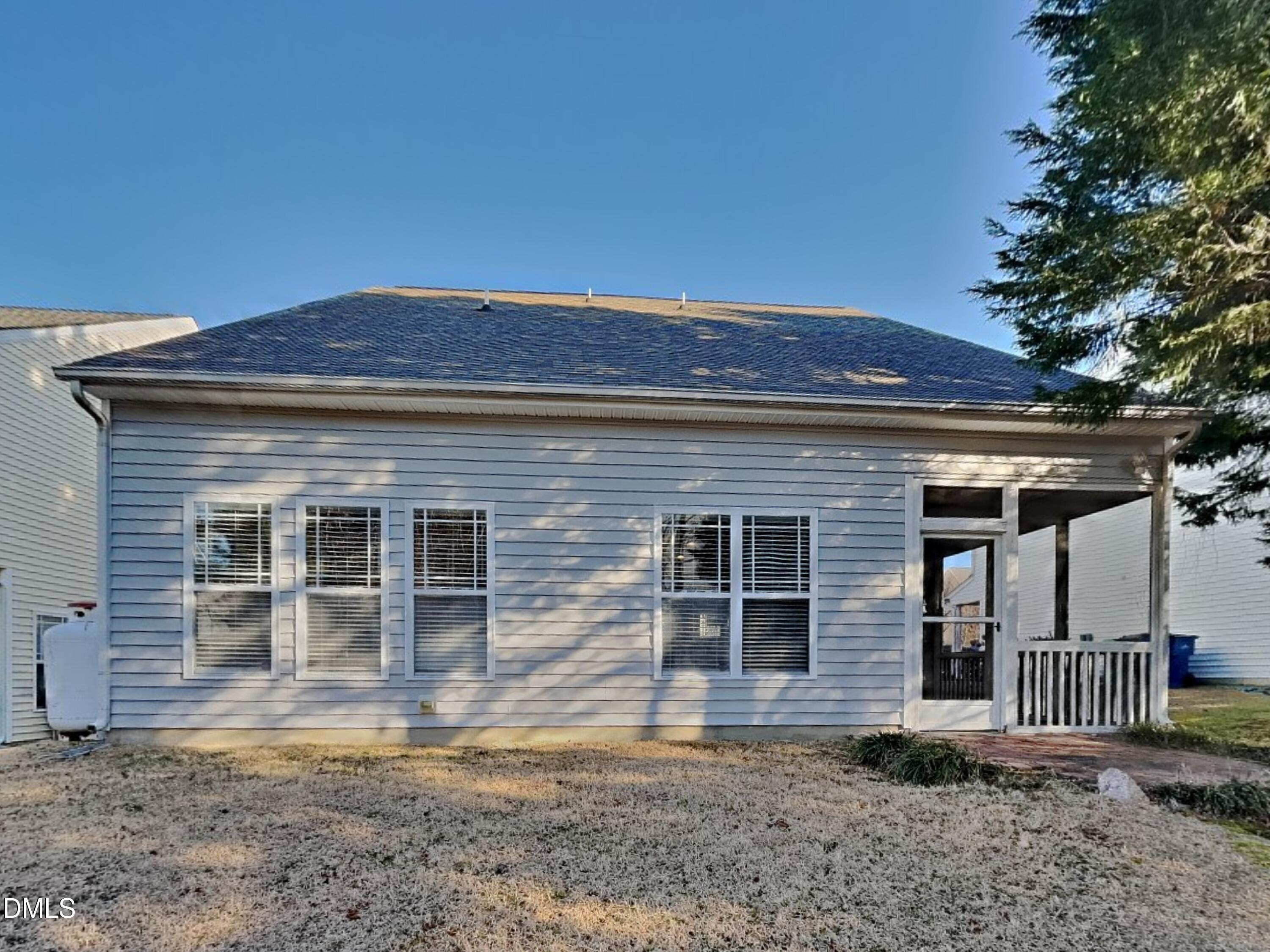 3152 Landing Falls Lane Raleigh, NC 27616 - Photo 24 of 24 a front view of a house with garden
