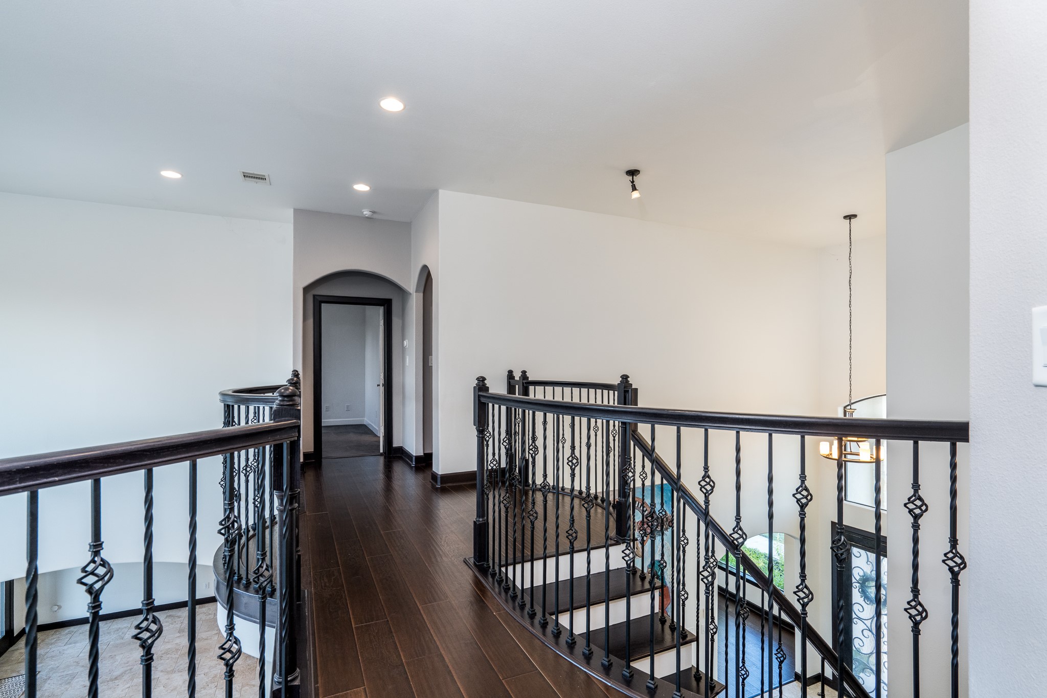 12748 Roy Road Pearland, TX 77581 - Photo 39 of 50 Upstairs begins with this beautiful landing and balconies along the cat walk.