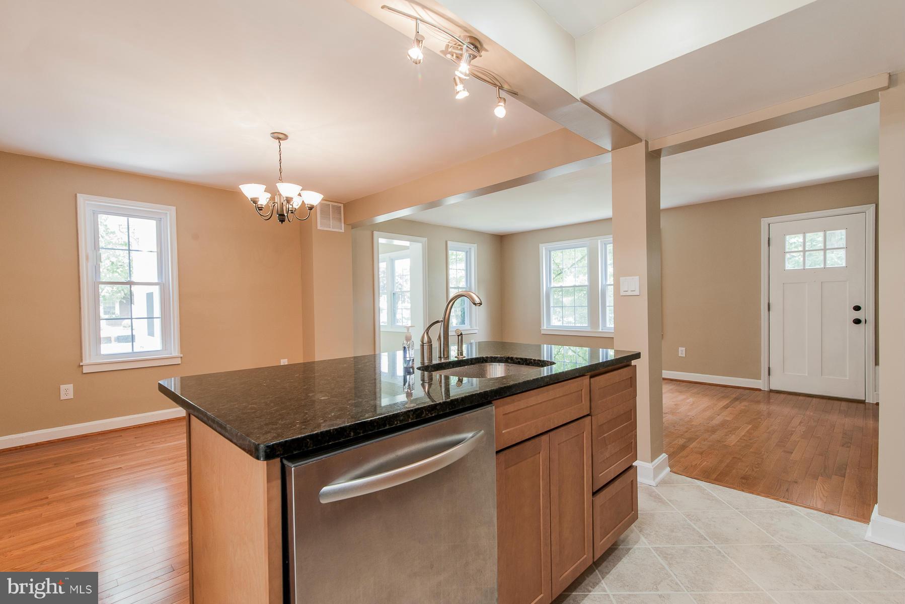 34 Eastship Road Baltimore, MD 21222 - Photo 7 of 19 a kitchen with granite countertop a sink cabinets and wooden floor