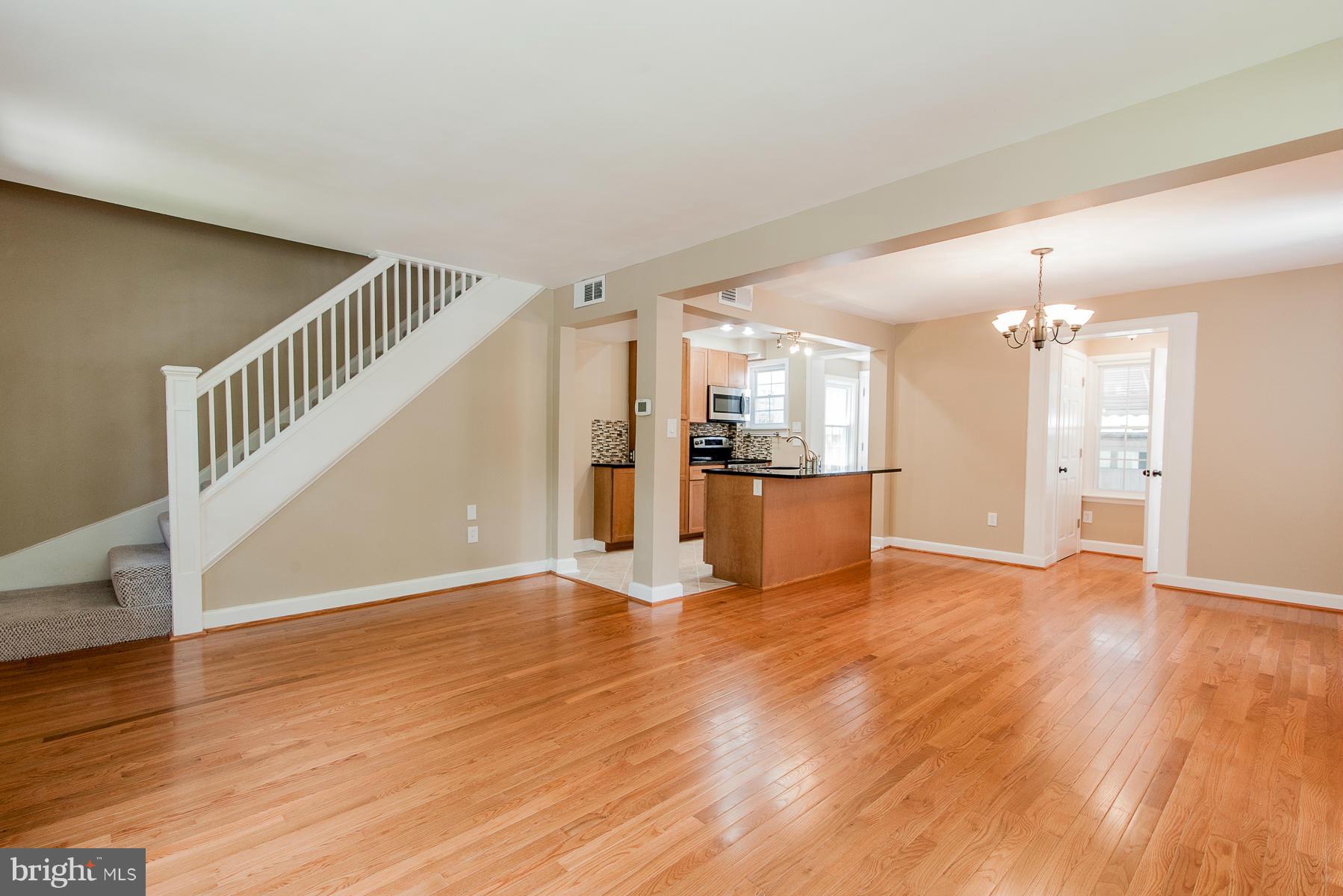 34 Eastship Road Baltimore, MD 21222 - Photo 9 of 19 a view of empty room with wooden floor