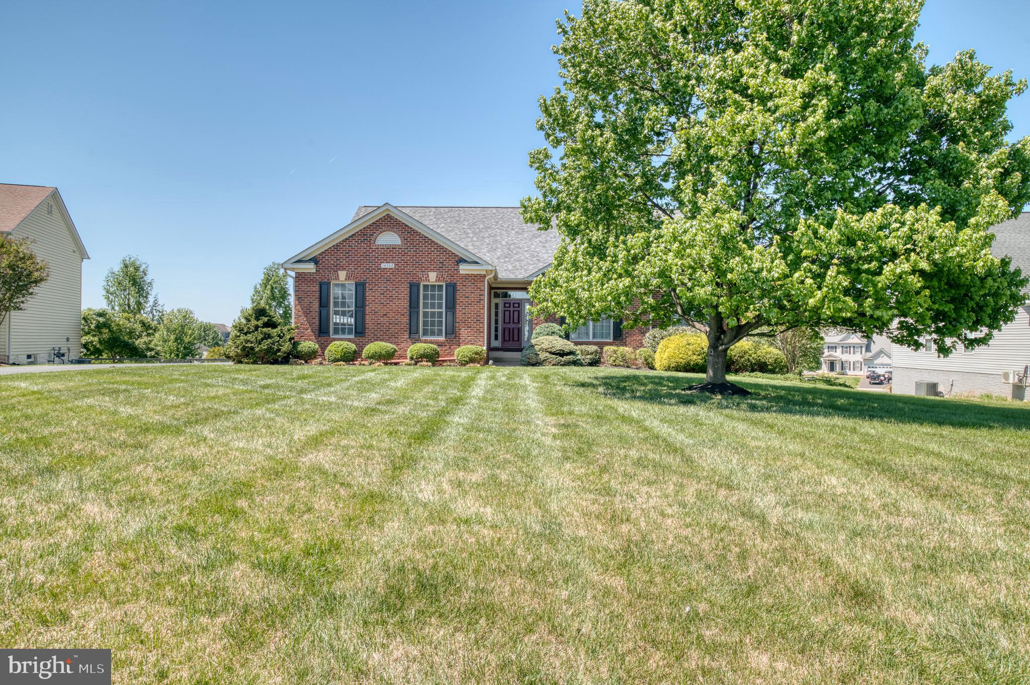 14308 South Hall Court Culpeper, VA 22701 - Photo 51 of 78 a front view of a house with a yard