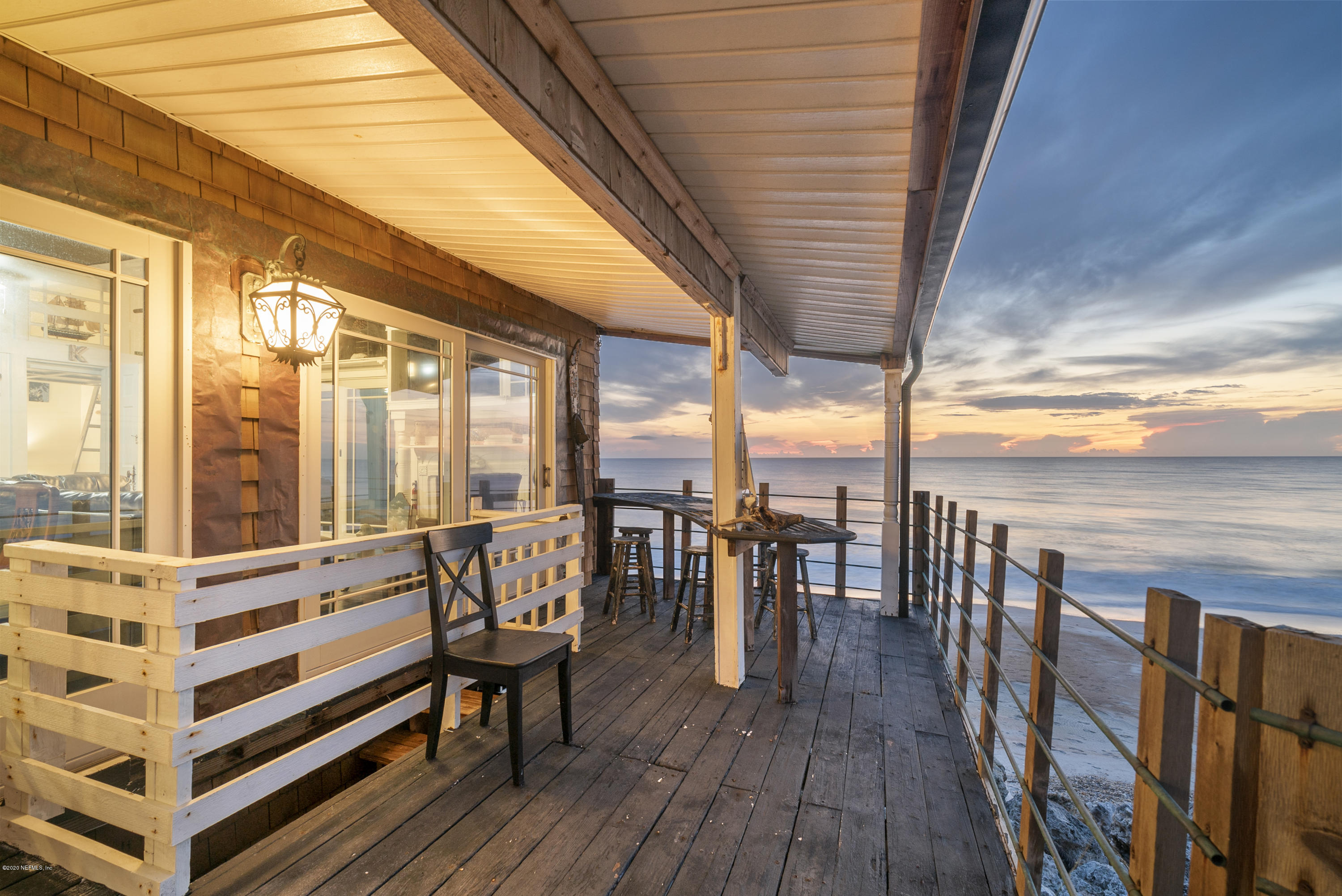 3490 Coastal Highway St. Augustine, FL 32084 - Photo 20 of 72 a balcony with wooden floor and outdoor space