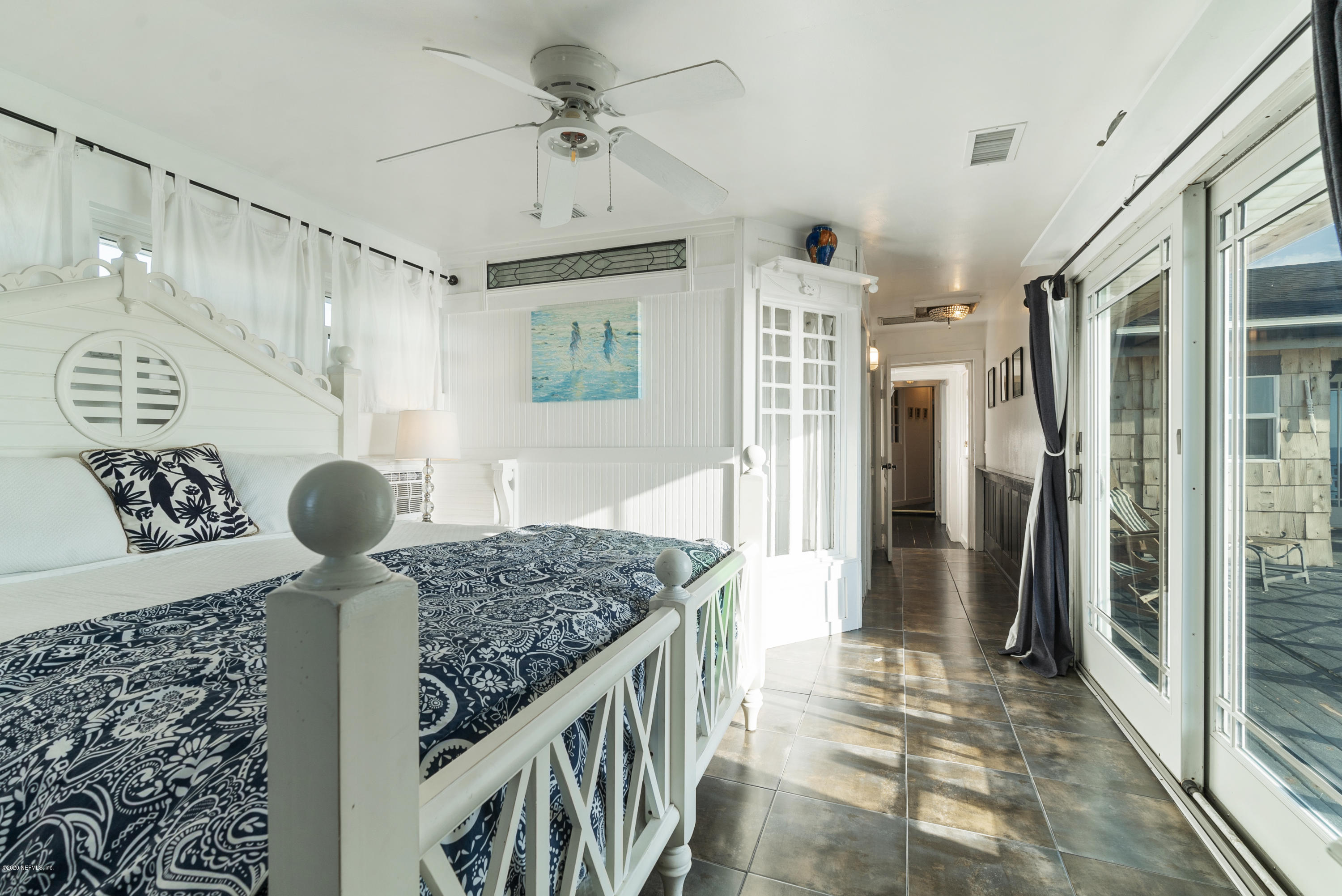 3490 Coastal Highway St. Augustine, FL 32084 - Photo 40 of 72 a kitchen with stainless steel appliances granite countertop a refrigerator and a stove