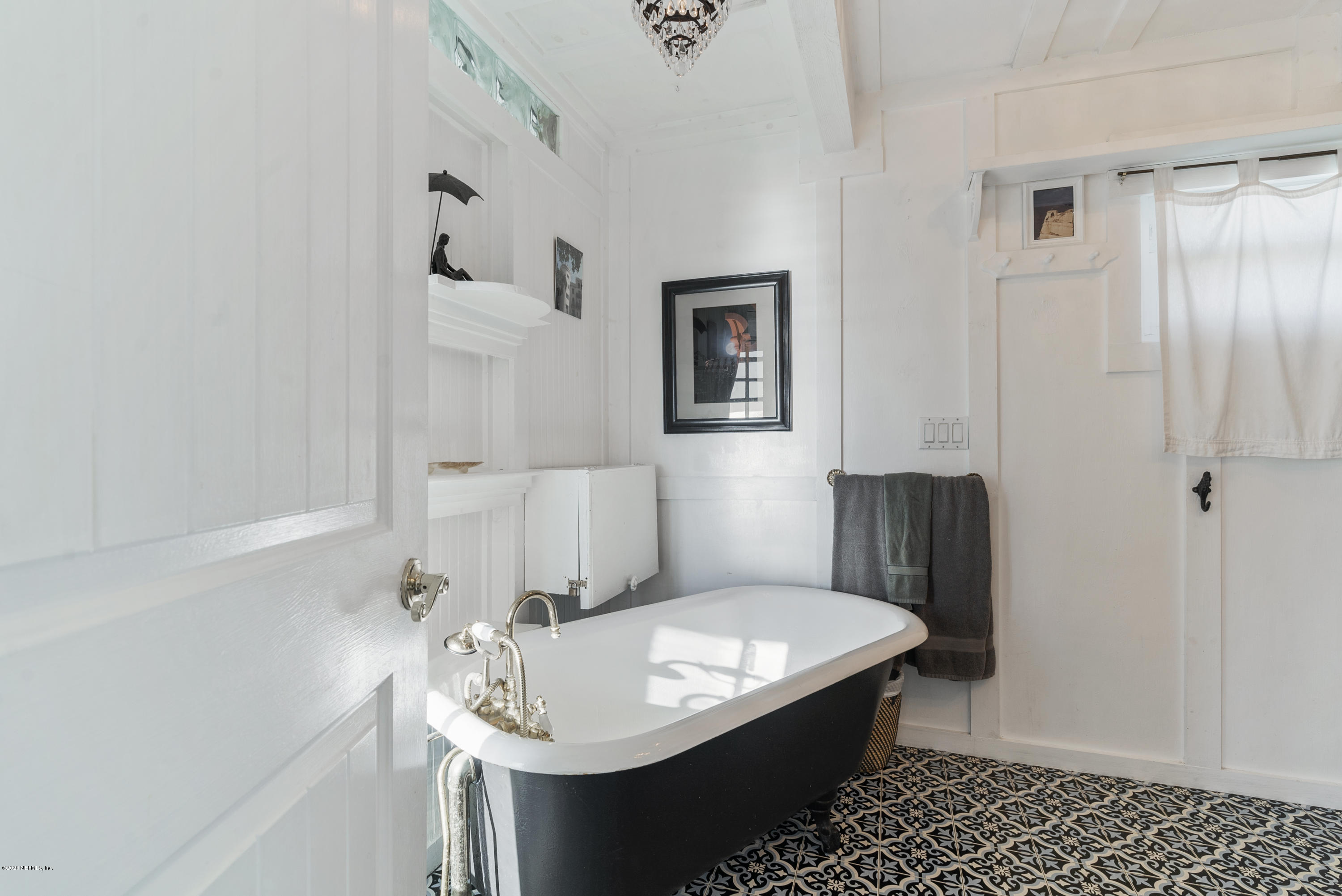 3490 Coastal Highway St. Augustine, FL 32084 - Photo 42 of 72 a bathroom with a sink toilet and shower