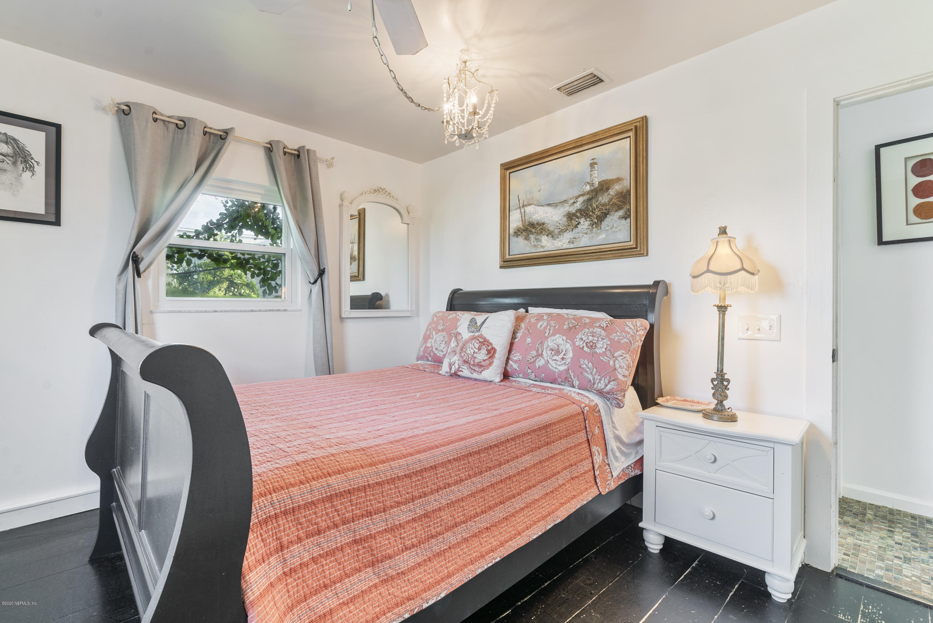 3490 Coastal Highway St. Augustine, FL 32084 - Photo 47 of 72 a bedroom with a bed and a window