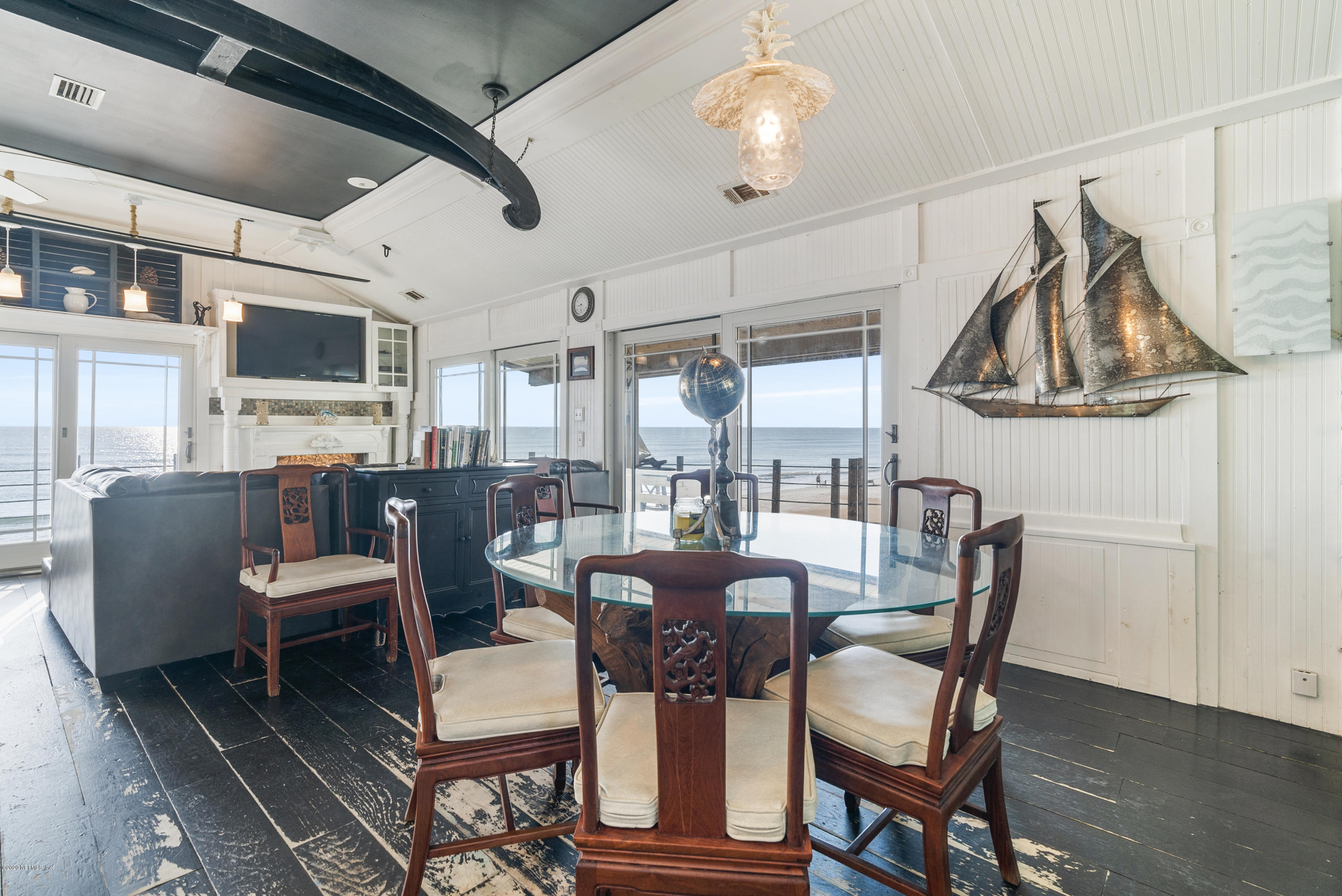 3490 Coastal Highway St. Augustine, FL 32084 - Photo 50 of 72 a view of a dining room with furniture window and wooden floor