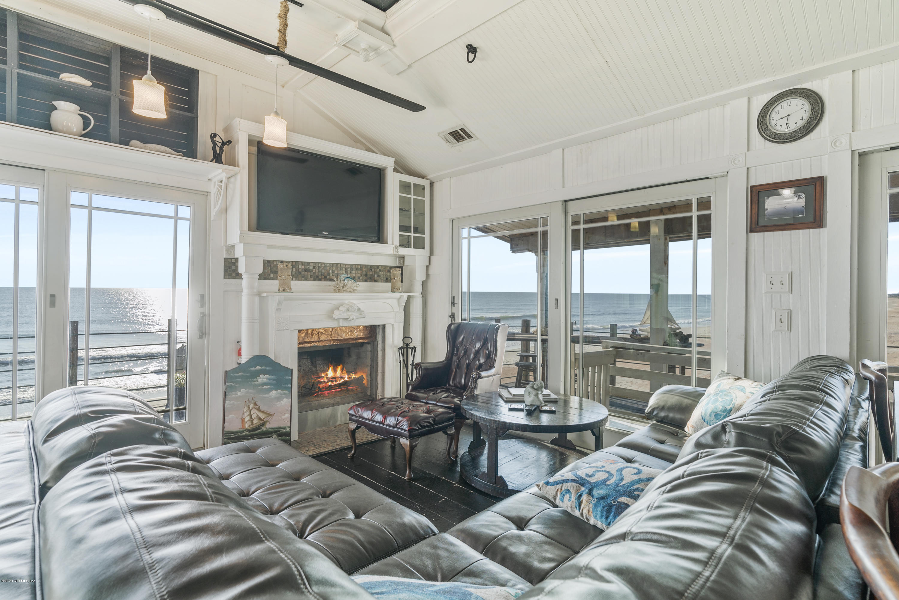 3490 Coastal Highway St. Augustine, FL 32084 - Photo 55 of 72 a view of a livingroom with furniture and a fireplace