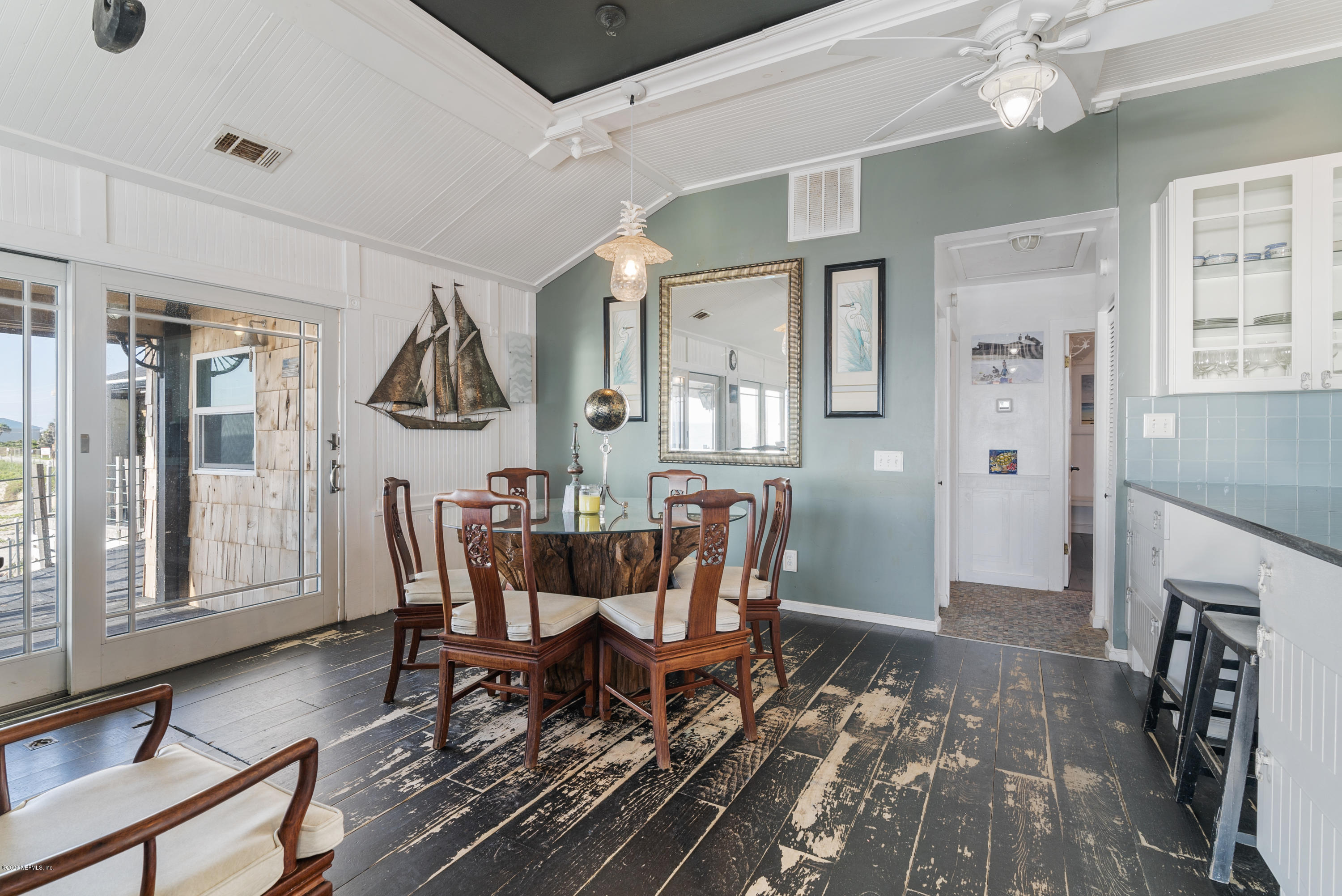 3490 Coastal Highway St. Augustine, FL 32084 - Photo 57 of 72 a view of a dining room with furniture window and wooden floor