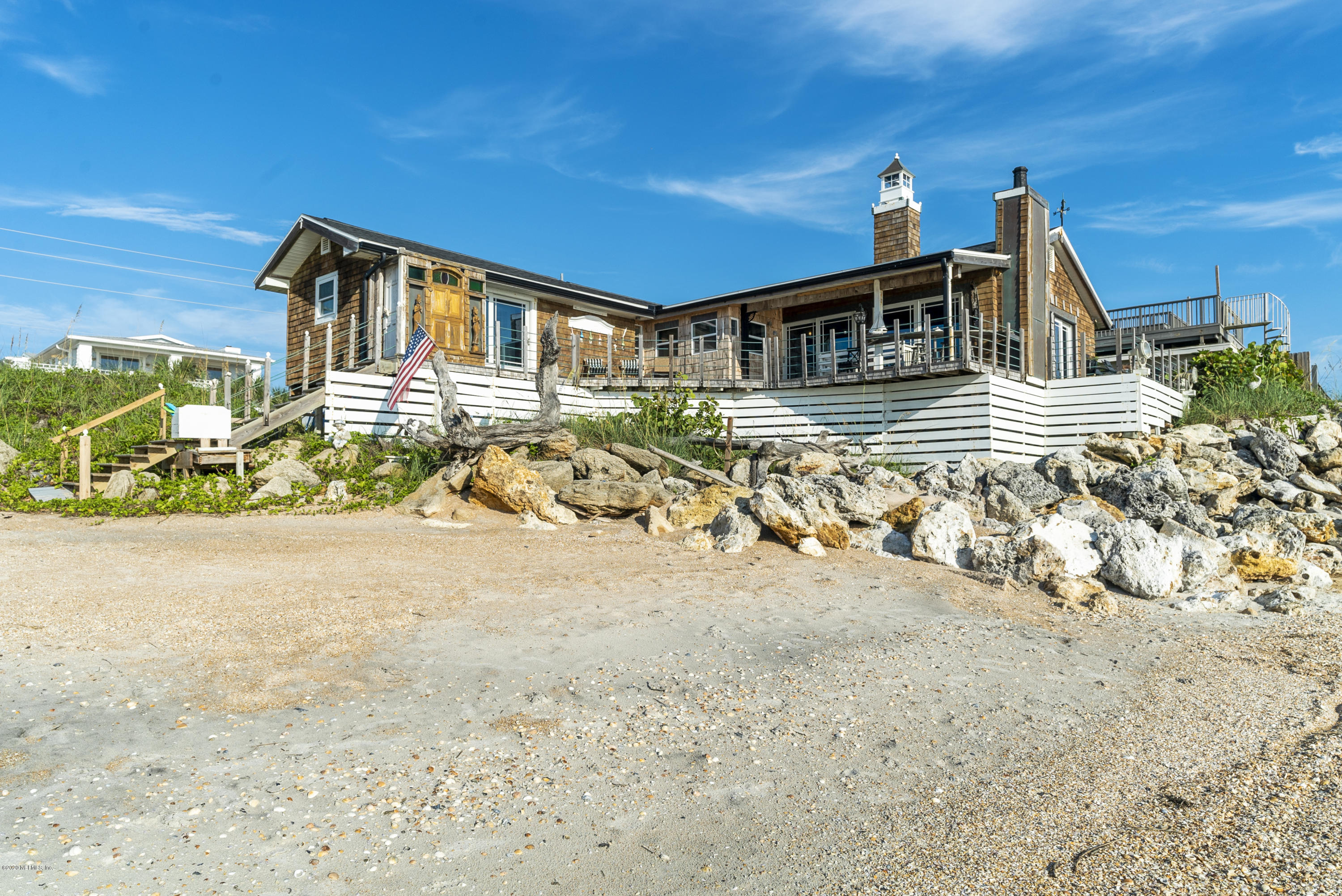 3490 Coastal Highway St. Augustine, FL 32084 - Photo 66 of 72 a front view of a house with a yard