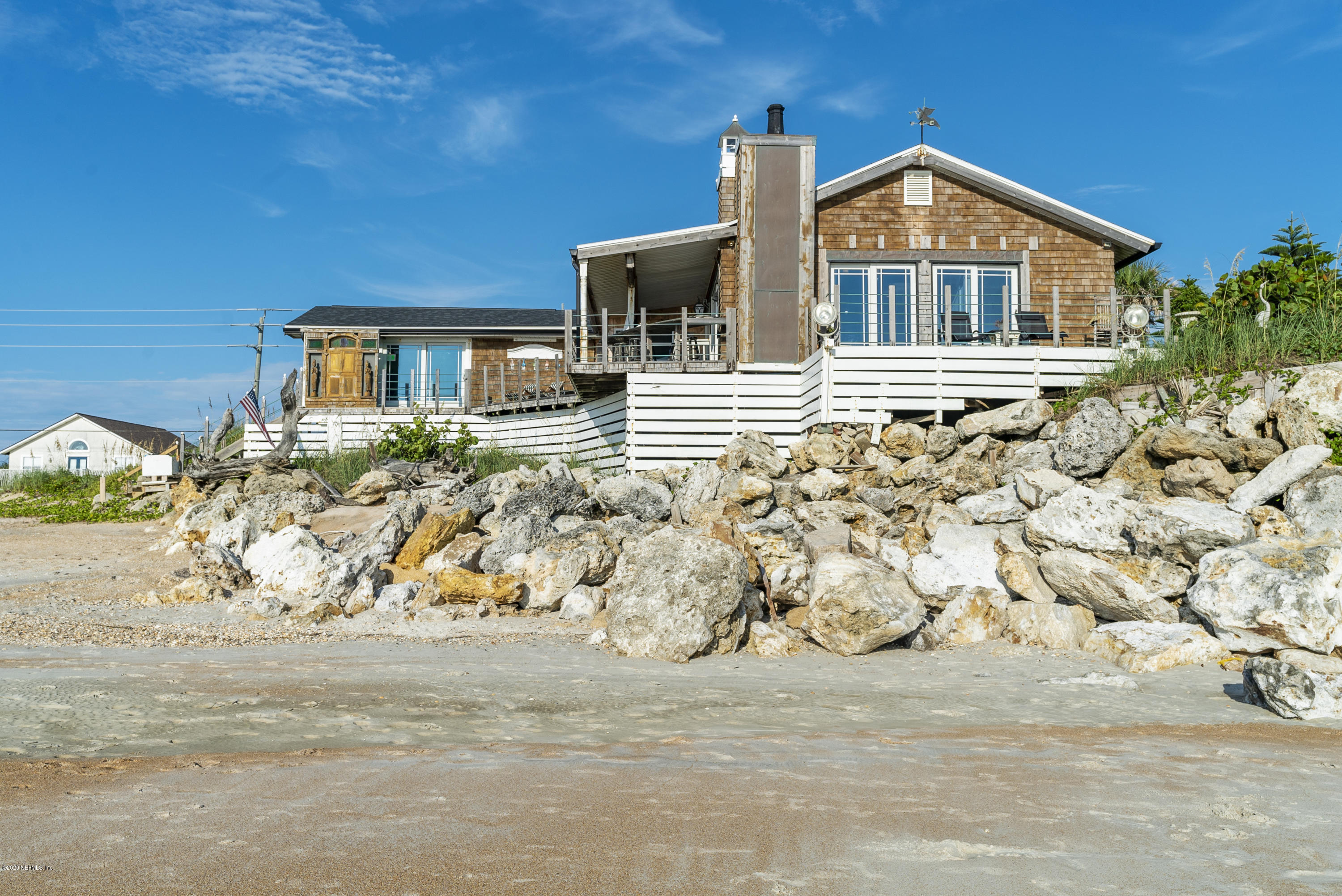 3490 Coastal Highway St. Augustine, FL 32084 - Photo 67 of 72 a front view of a house with a yard