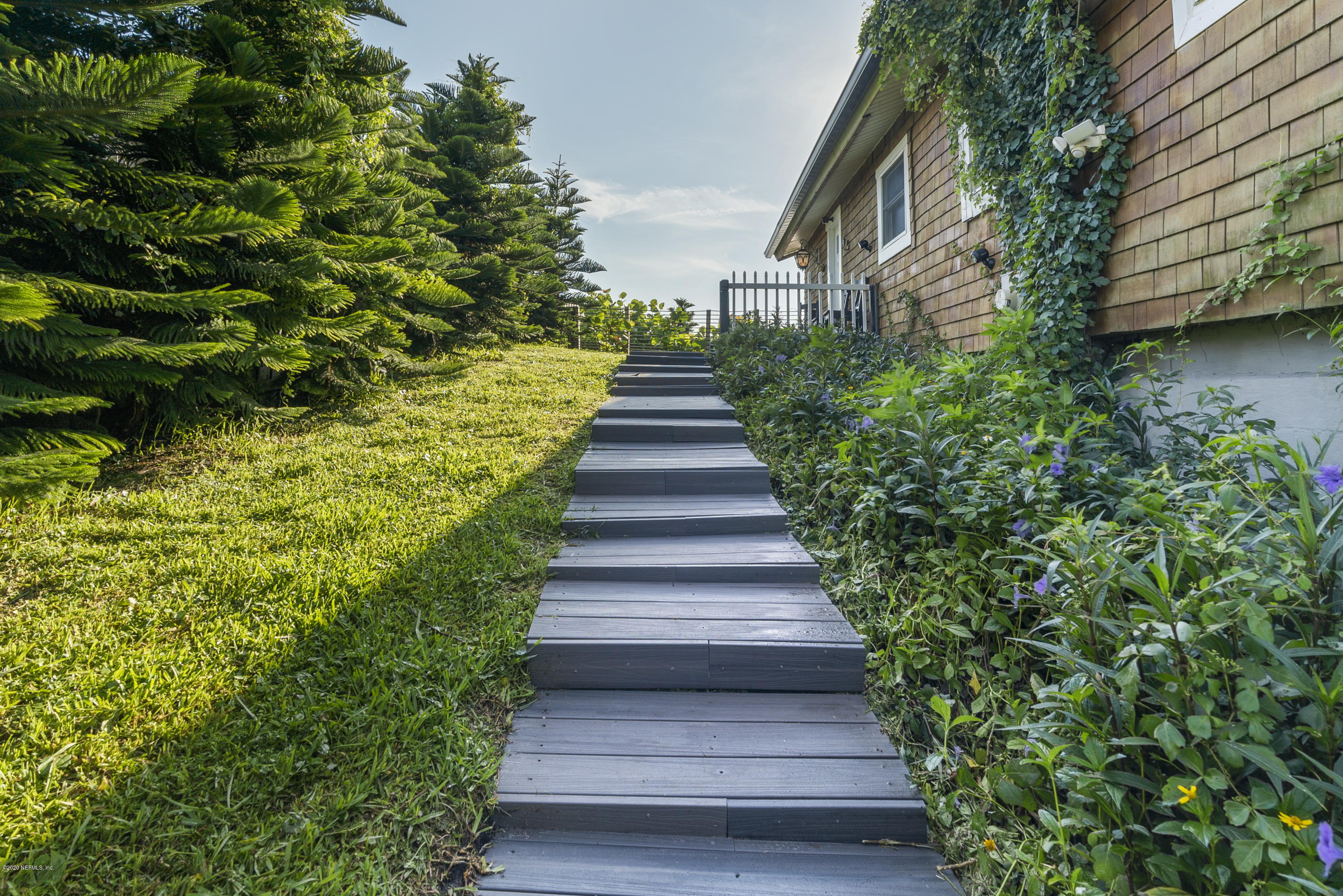 3490 Coastal Highway St. Augustine, FL 32084 - Photo 71 of 72 a view of a garden with pathway
