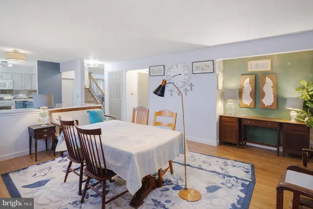 a living room with furniture rug and window